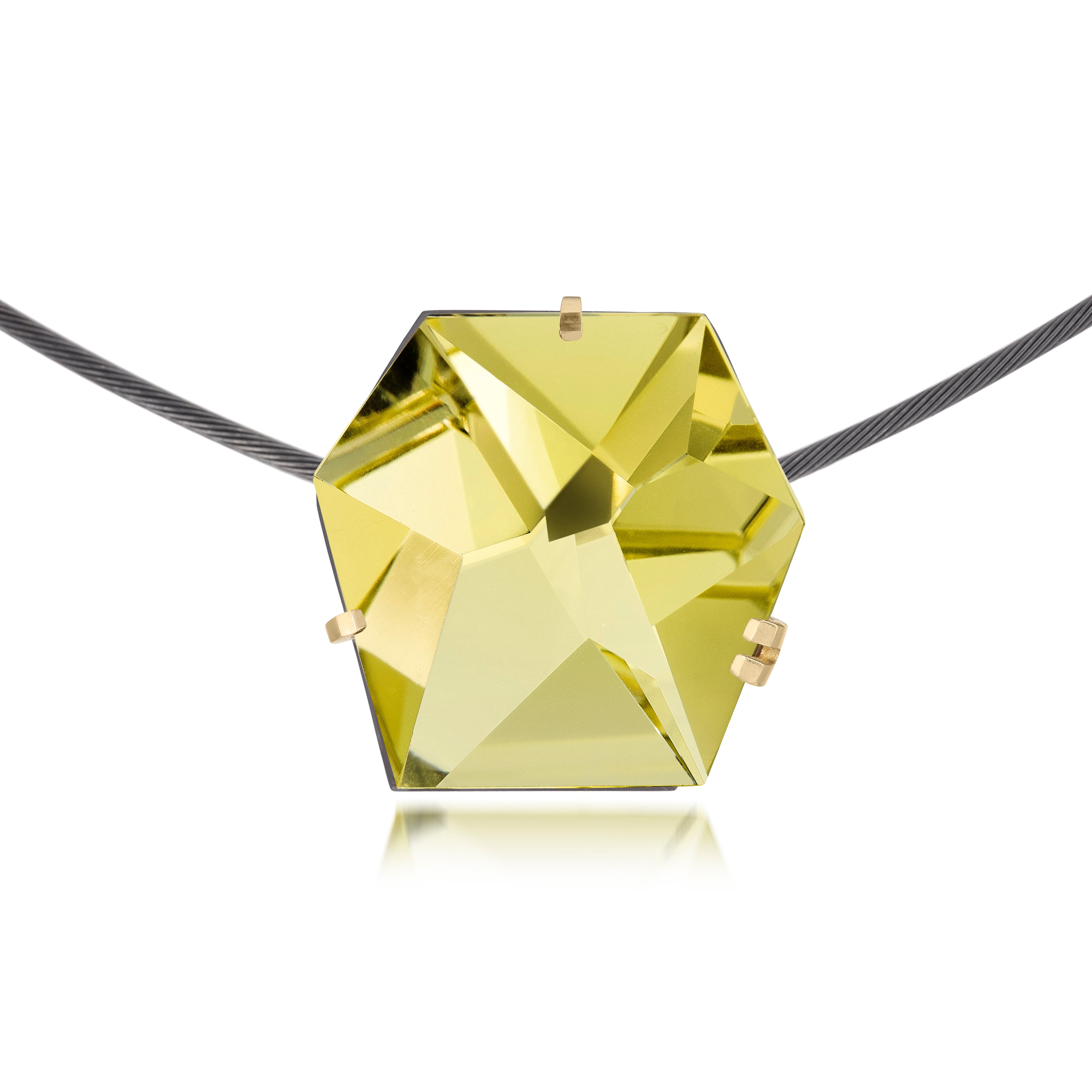 Facets necklace of natural gemstone set in oxidized silver. Clean lines and a geometric form join to create a unique, hand cut faceted chunk of lemon citrine gemstone; prong 18k gold, with a simple neckring of oxidized sterling. Gemstone 27.25- 28.75 tcw.