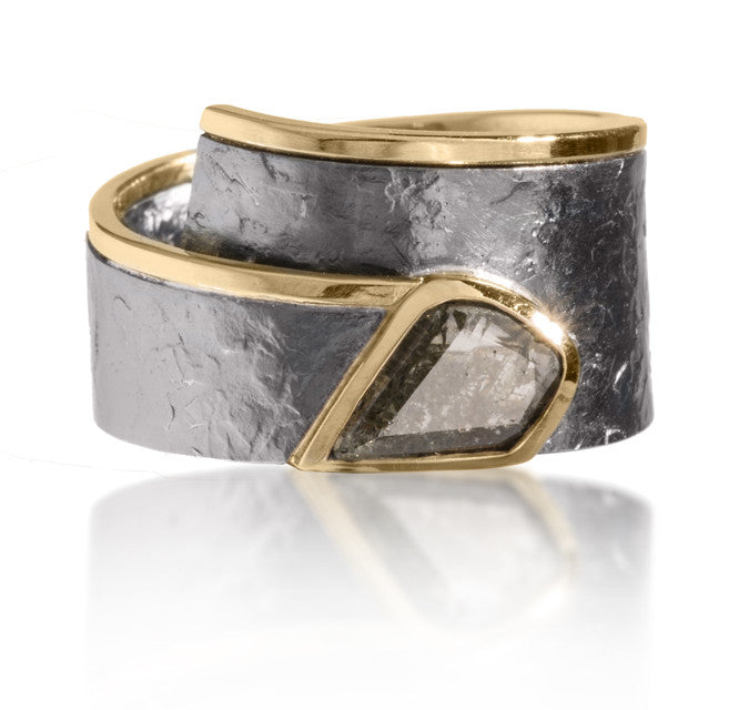 Cyclone Ring #3 in 18k gold and oxidized sterling silver with large bezel set center diamond. One of a kind diamond custom set in a one of a kind ring. Forged, textured and fabricated by hand. Amorphous shaped salt and pepper diamond slice, .42 ct.