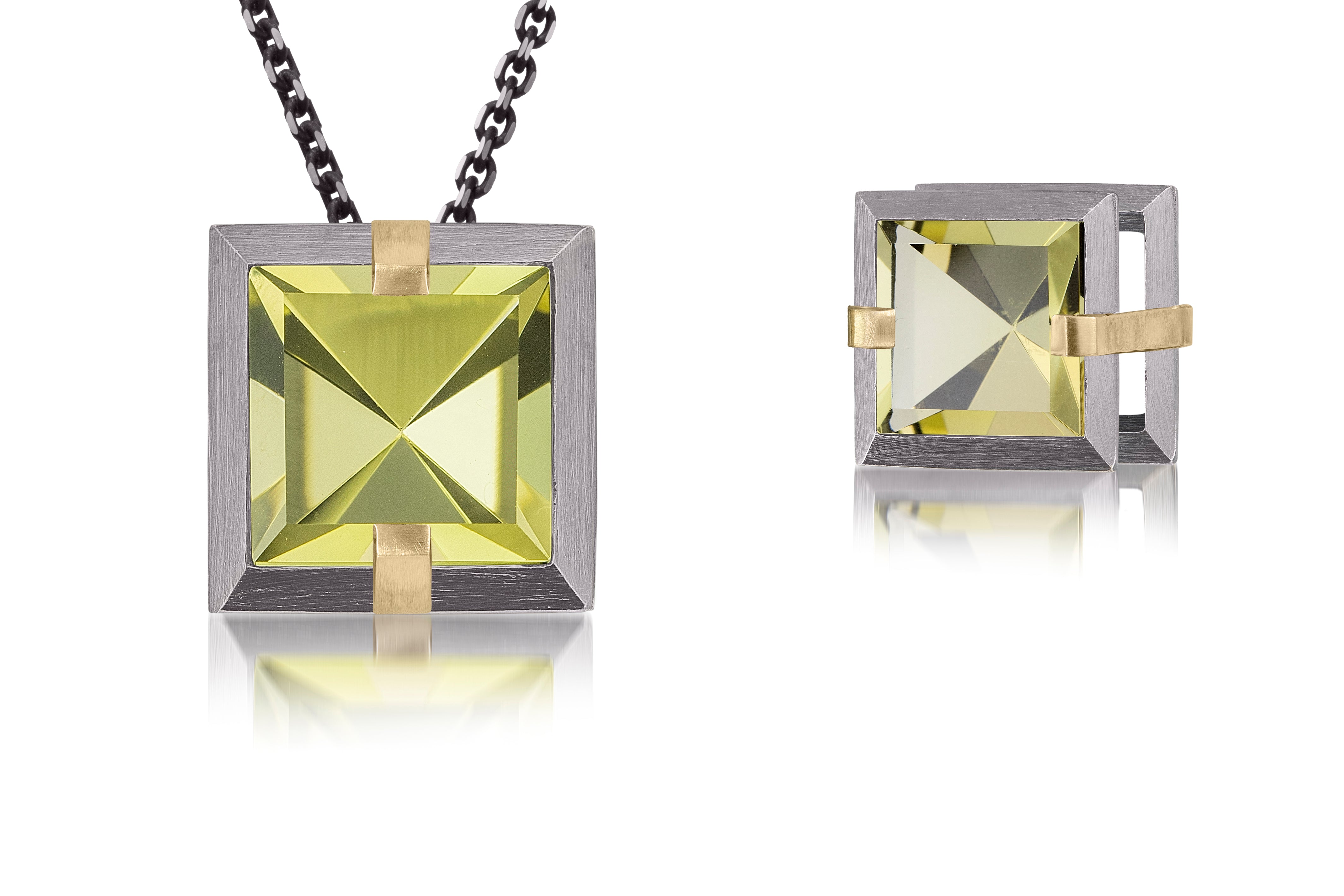 This small Facets slide pendant in oxidized sterling and 18k gold is set with natural gemstone. Crisp, hand cut, faceted gemstones are set in a square two level frame of oxidized silver, accented by 18k gold prongs. Gemstone 3.26+ tcw.