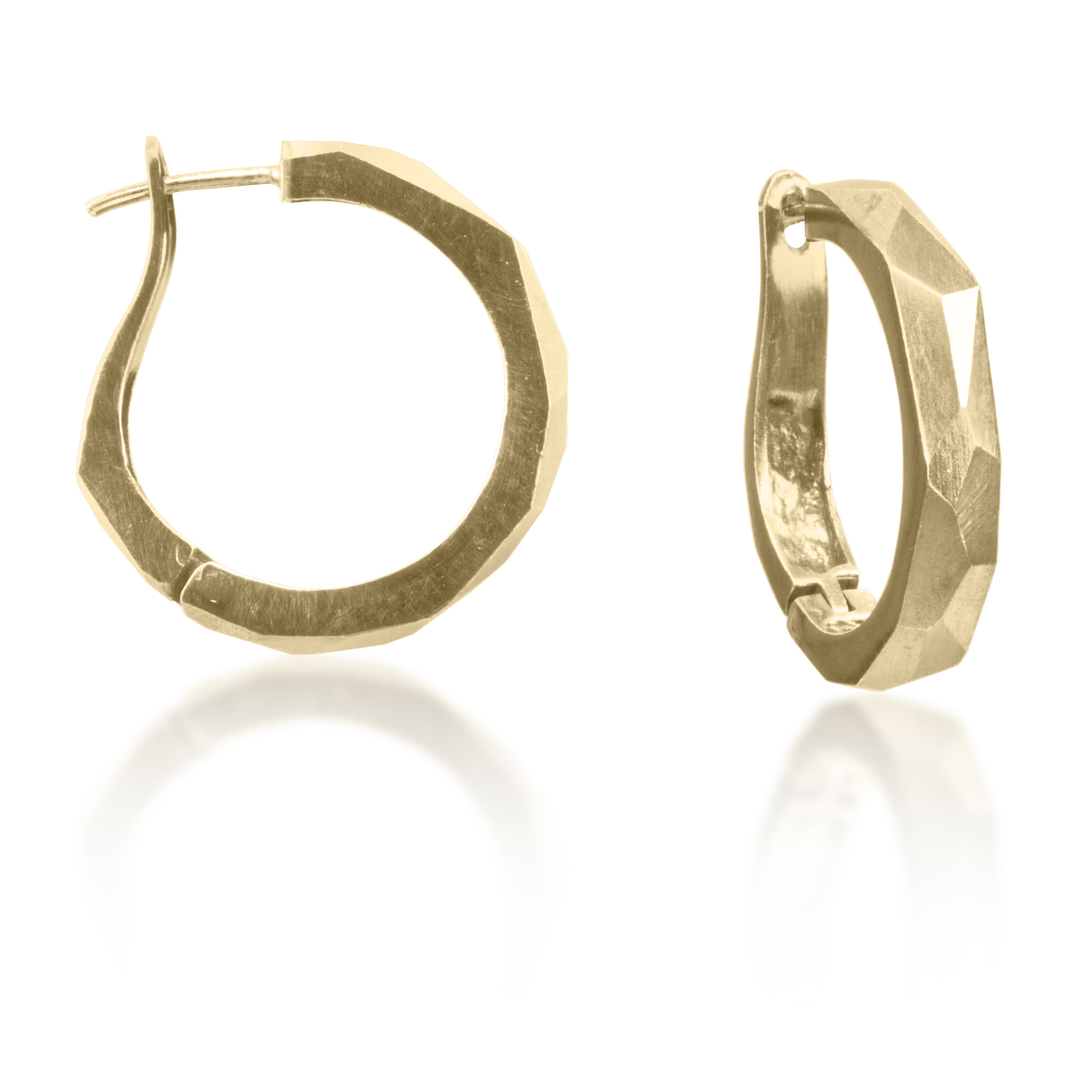 Chunky bigger huggie hoops, crisply hand faceted in four color ways, oxidized silver, 18k gold, palladium or platinum. 18k ear posts and a satisfying click closer.