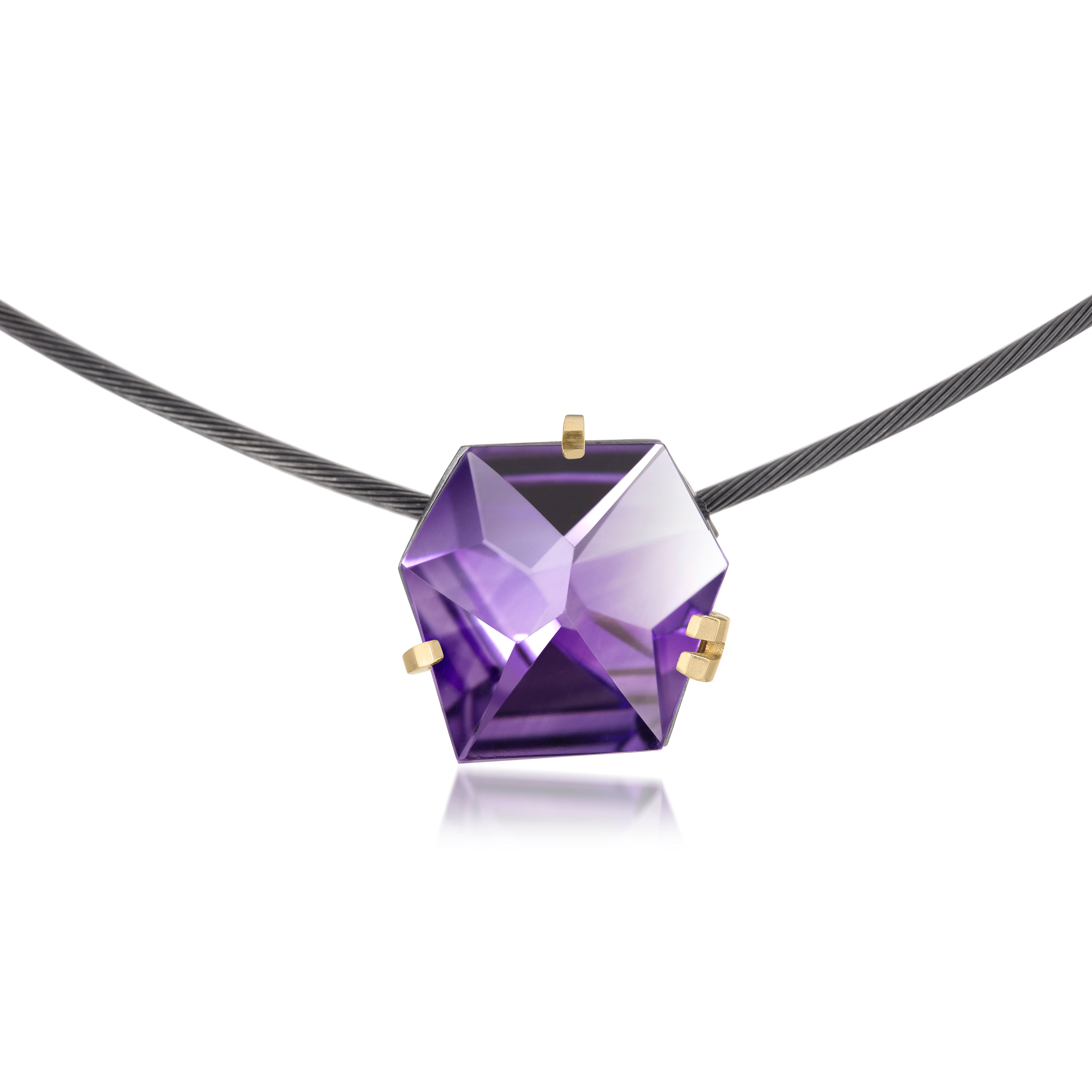 This small size Facets necklace of natural gemstone is set in oxidized silver. Clean lines and a geometric form join to create this neckpiece with a unique, hand cut faceted chunk of gemstone prong set in 18k gold, coupled with a simple neckring of oxidized sterling. Necklace features a friction tube clasp to produce a continuous, uninterrupted line. Gemstone 8.5 tcw.