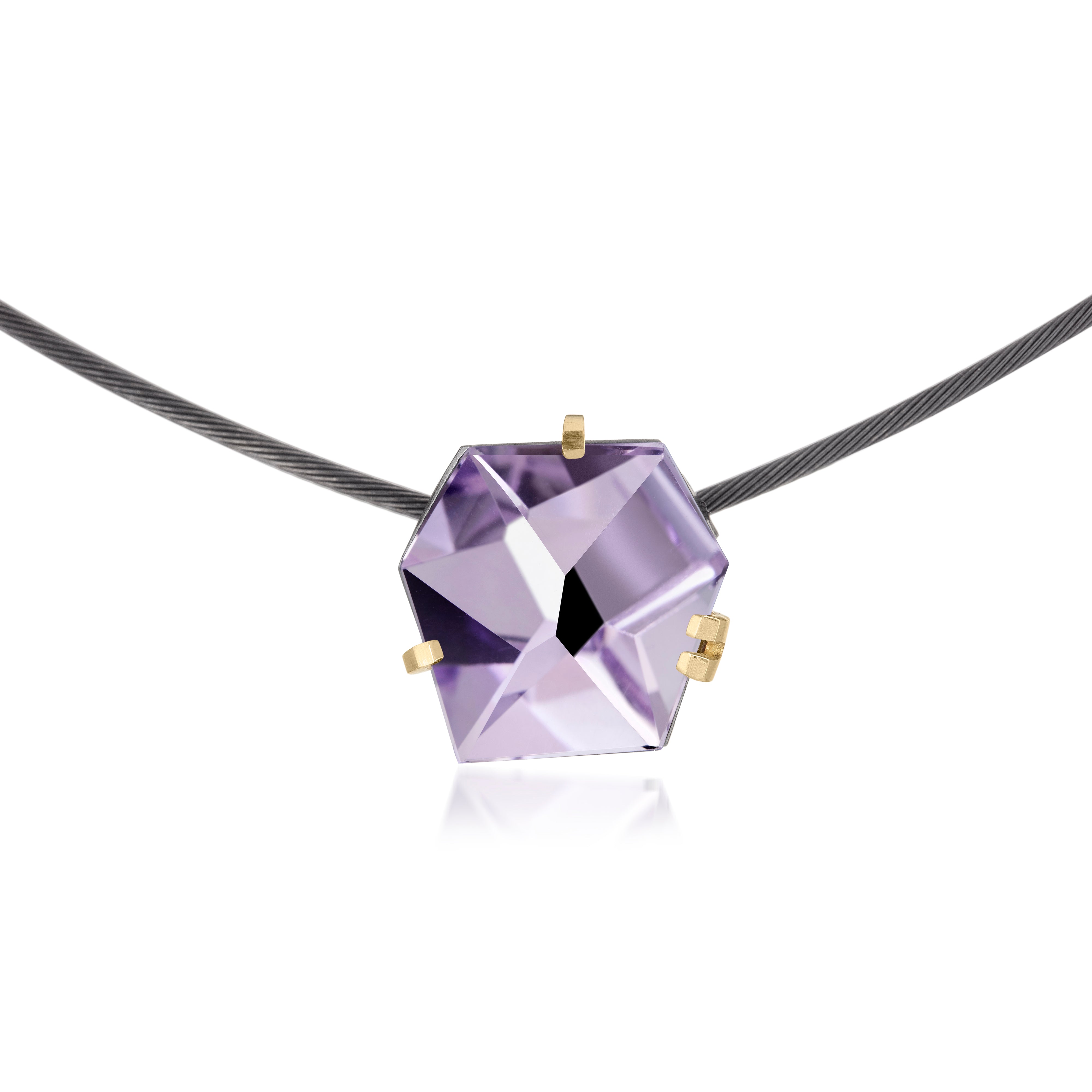 This small size Facets necklace of natural gemstone is set in oxidized silver. Clean lines and a geometric form join to create this neckpiece with a unique, hand cut faceted chunk of gemstone prong set in 18k gold, coupled with a simple neckring of oxidized sterling. Necklace features a friction tube clasp to produce a continuous, uninterrupted line. Gemstone 8.5 tcw.