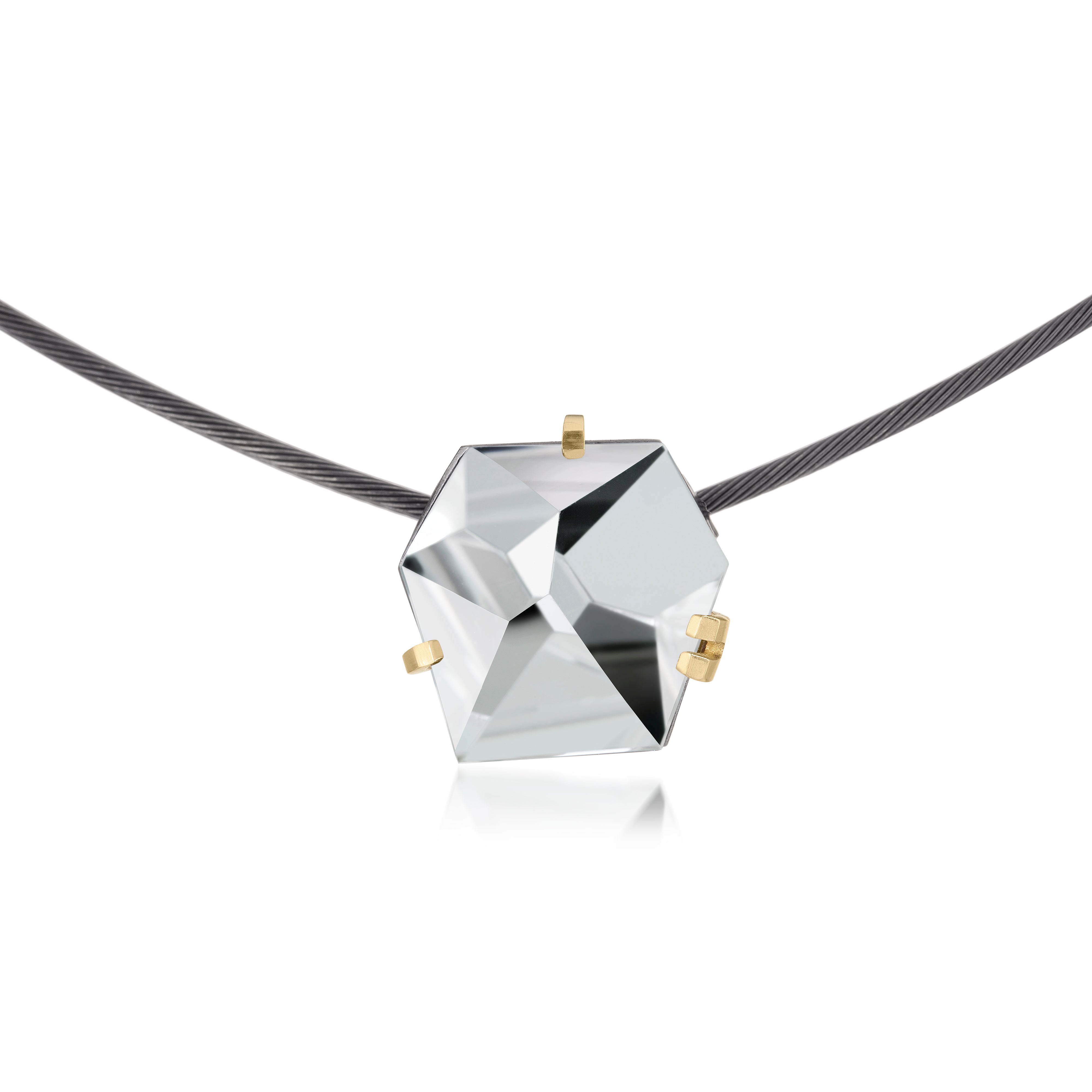 This small size Facets necklace of natural gemstone is set in oxidized silver. Clean lines and a geometric form join to create this neckpiece with a unique, hand cut faceted chunk of gemstone prong set in 18k gold, coupled with a simple neckring of oxidized sterling. Necklace features a friction tube clasp to produce a continuous, uninterrupted line. Gemstone 8.5 tcw.