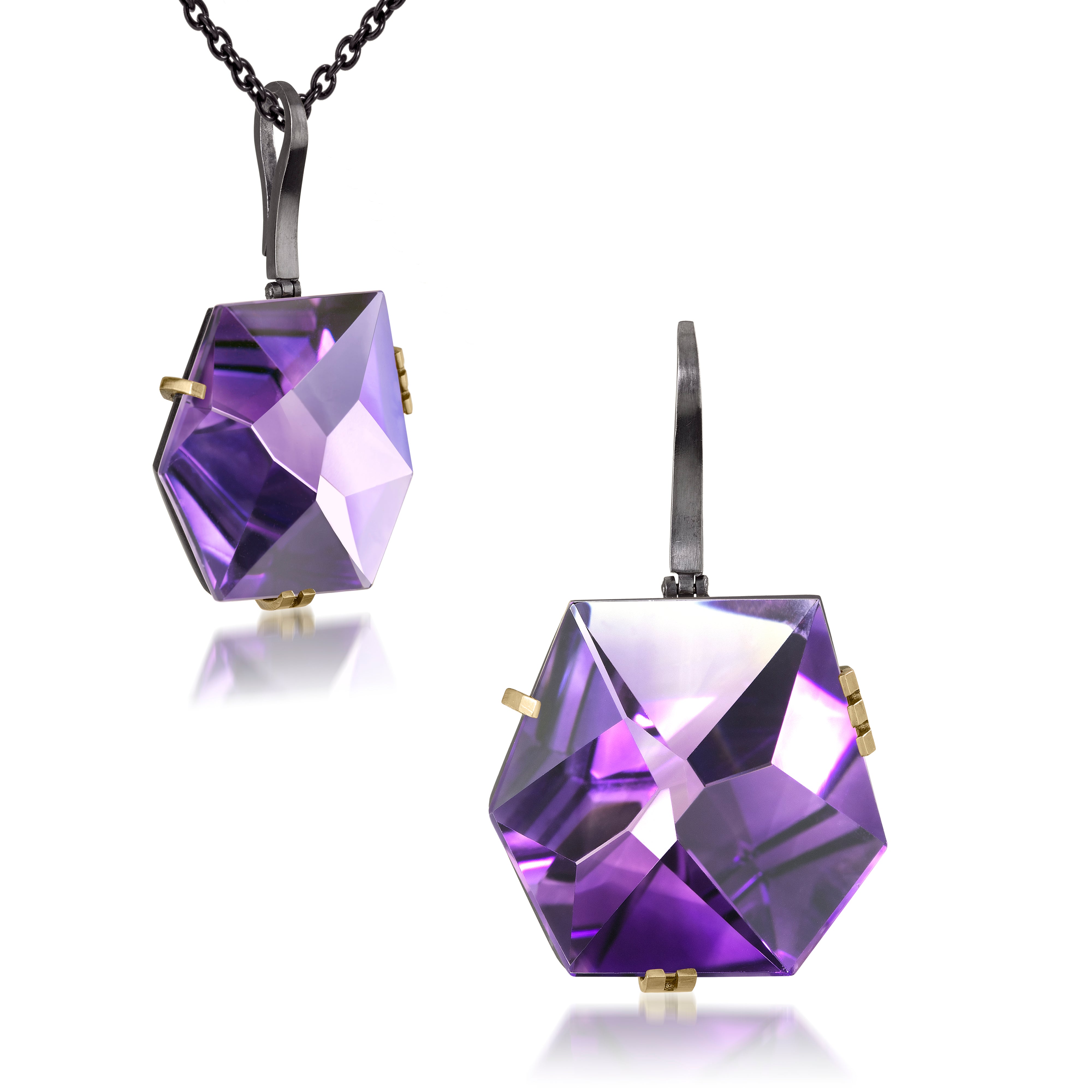 This large Facets pendant in oxidized sterling and 18k gold is set with natural gemstone. The irresistible, oversized gem pendant has amazing presence. Unique, hand cut faceted chunks of gemstone prong set in 18k gold prongs hanging from a small bail of 18k gold or oxidized silver.