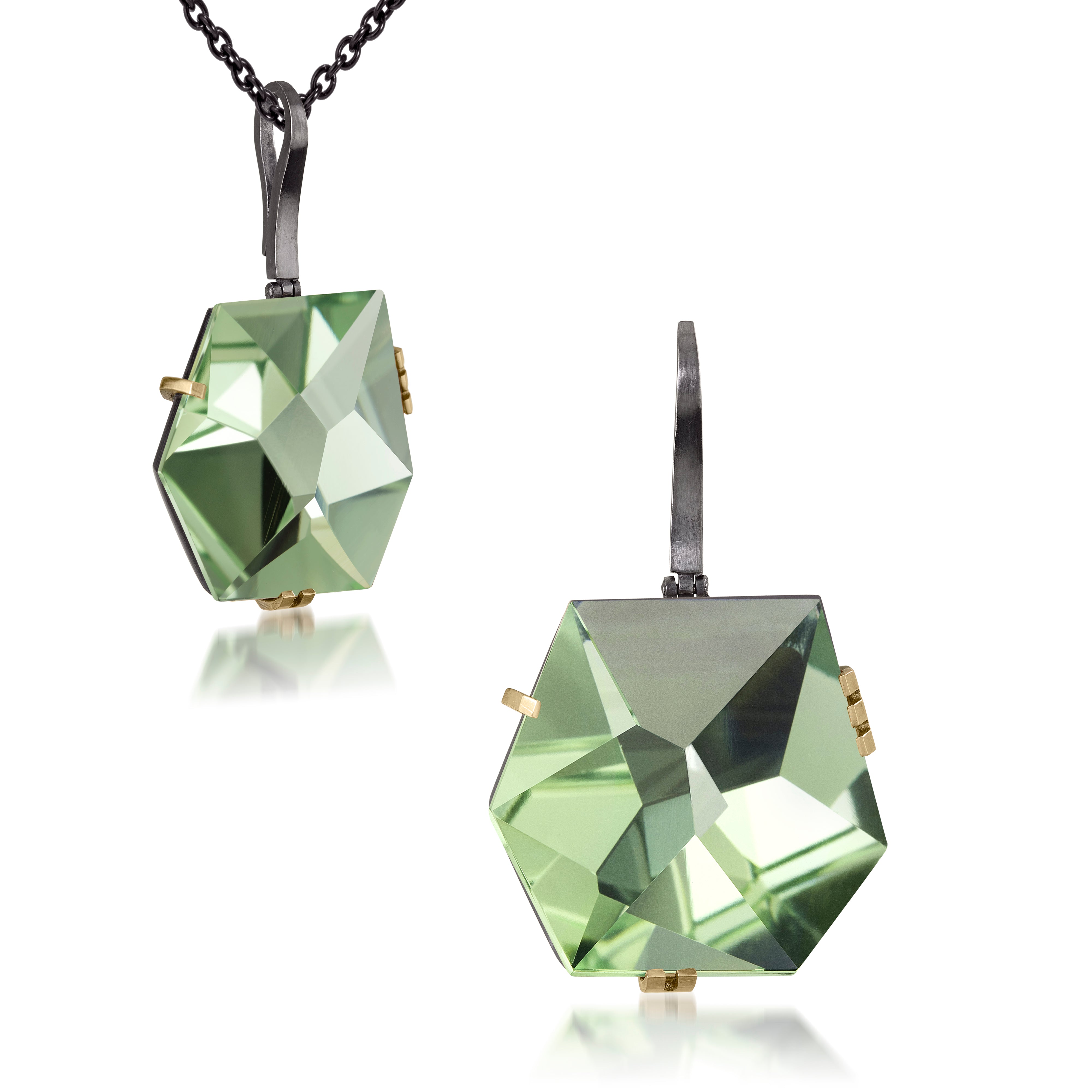 This large Facets pendant in oxidized sterling and 18k gold is set with natural gemstone. The irresistible, oversized gem pendant has amazing presence. Unique, hand cut faceted chunks of gemstone prong set in 18k gold prongs hanging from a small bail of 18k gold or oxidized silver.