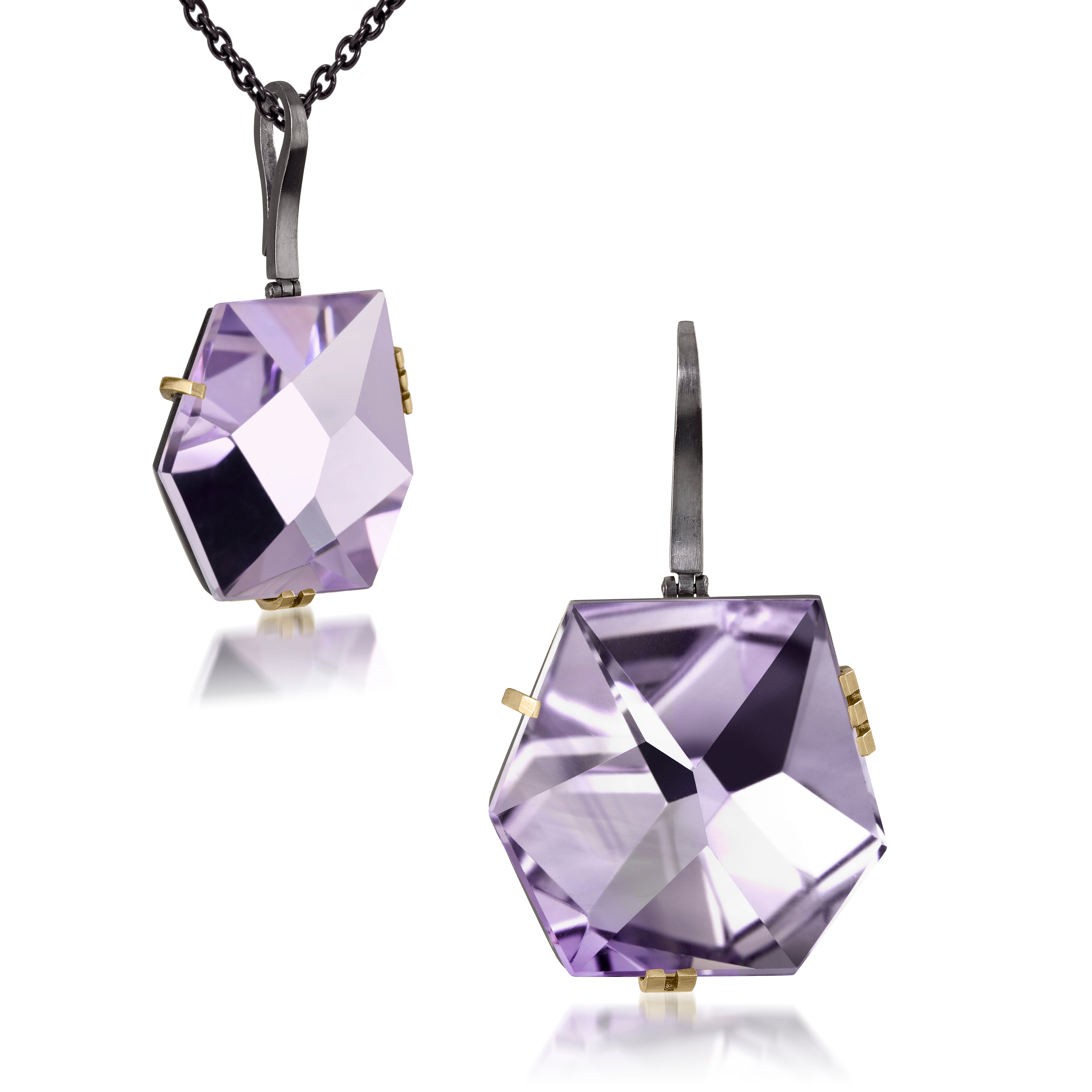 This large Facets pendant in oxidized sterling and 18k gold is set with natural gemstone. The irresistible, oversized gem pendant has amazing presence. Unique, hand cut faceted chunks of gemstone prong set in 18k gold prongs hanging from a small bail of 18k gold or oxidized silver.