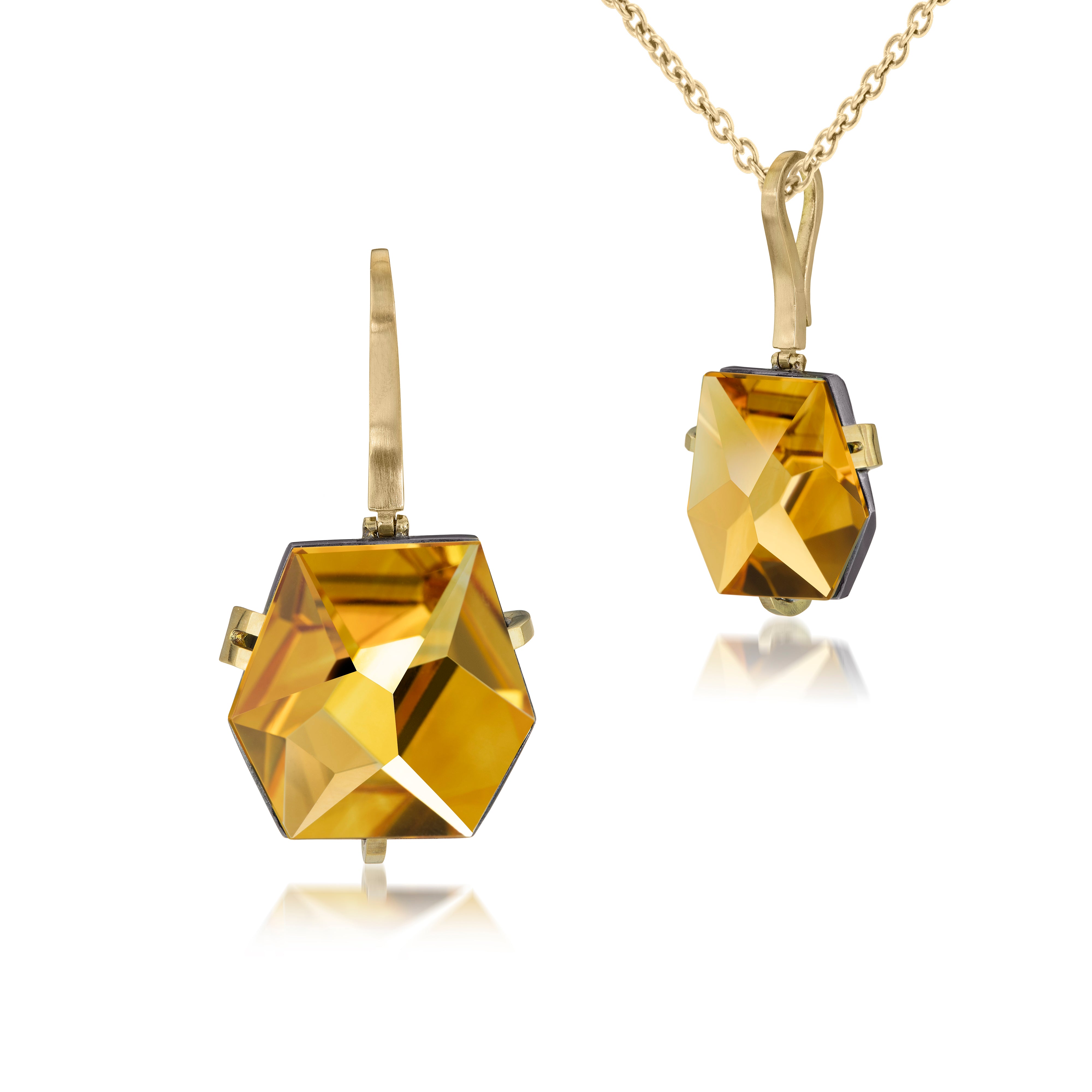 This medium size Facets pendant in oxidized sterling and 18k gold is set with natural gemstone. Unique, hand cut faceted chunks of gemstone are prong set in 18k gold prongs hang from a small bail of 18k gold or oxidized silver. 