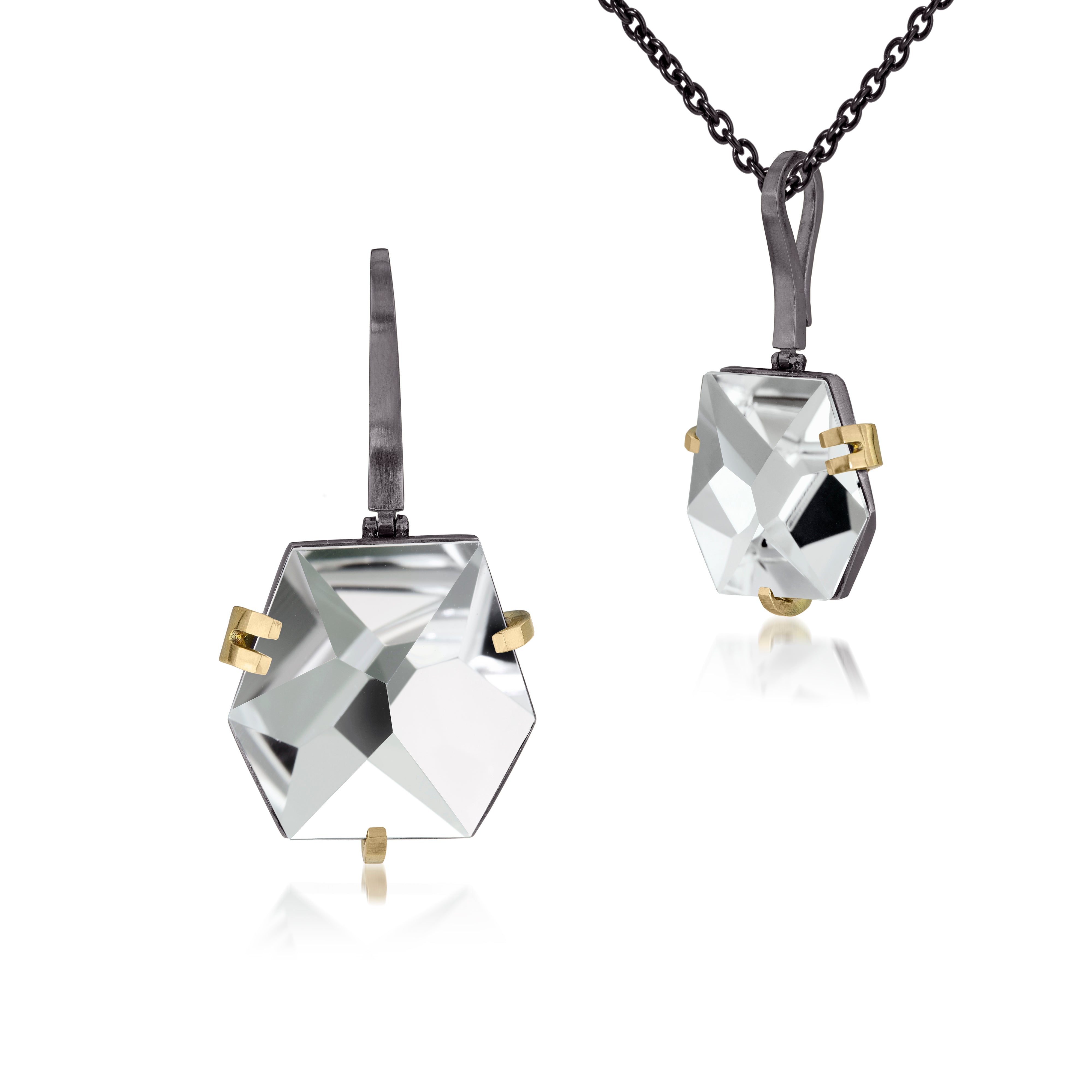 This medium size Facets pendant in oxidized sterling and 18k gold is set with natural gemstone. Unique, hand cut faceted chunks of gemstone are prong set in 18k gold prongs hang from a small bail of 18k gold or oxidized silver. 