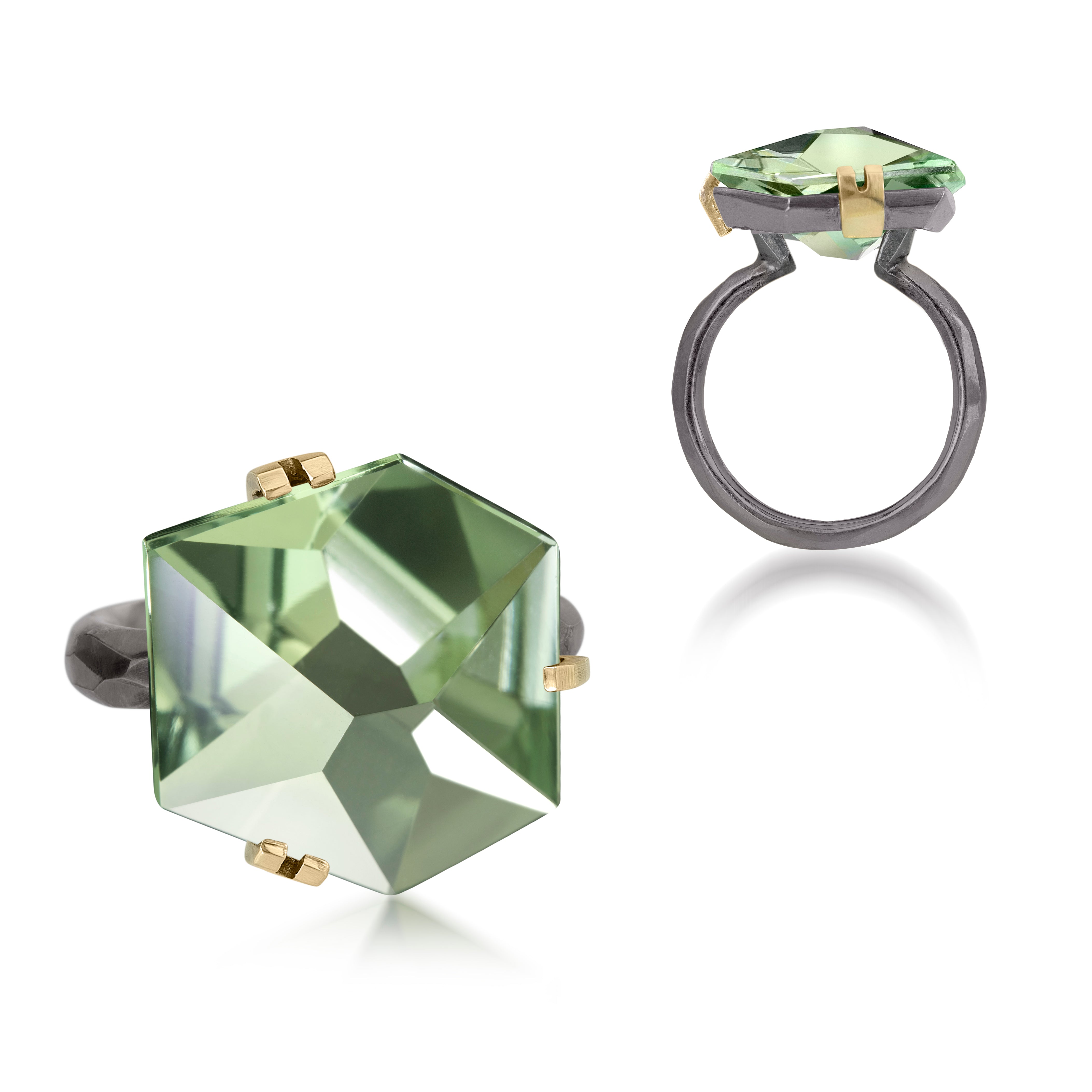 This medium size Facets ring in oxidized sterling and 18k is set with natural gemstone. Unique, hand cut faceted chunks of gemstone are prong set in 18k gold with a hand faceted oxidized silver ring shank. Gemstone 11.5-12.5 tcw.