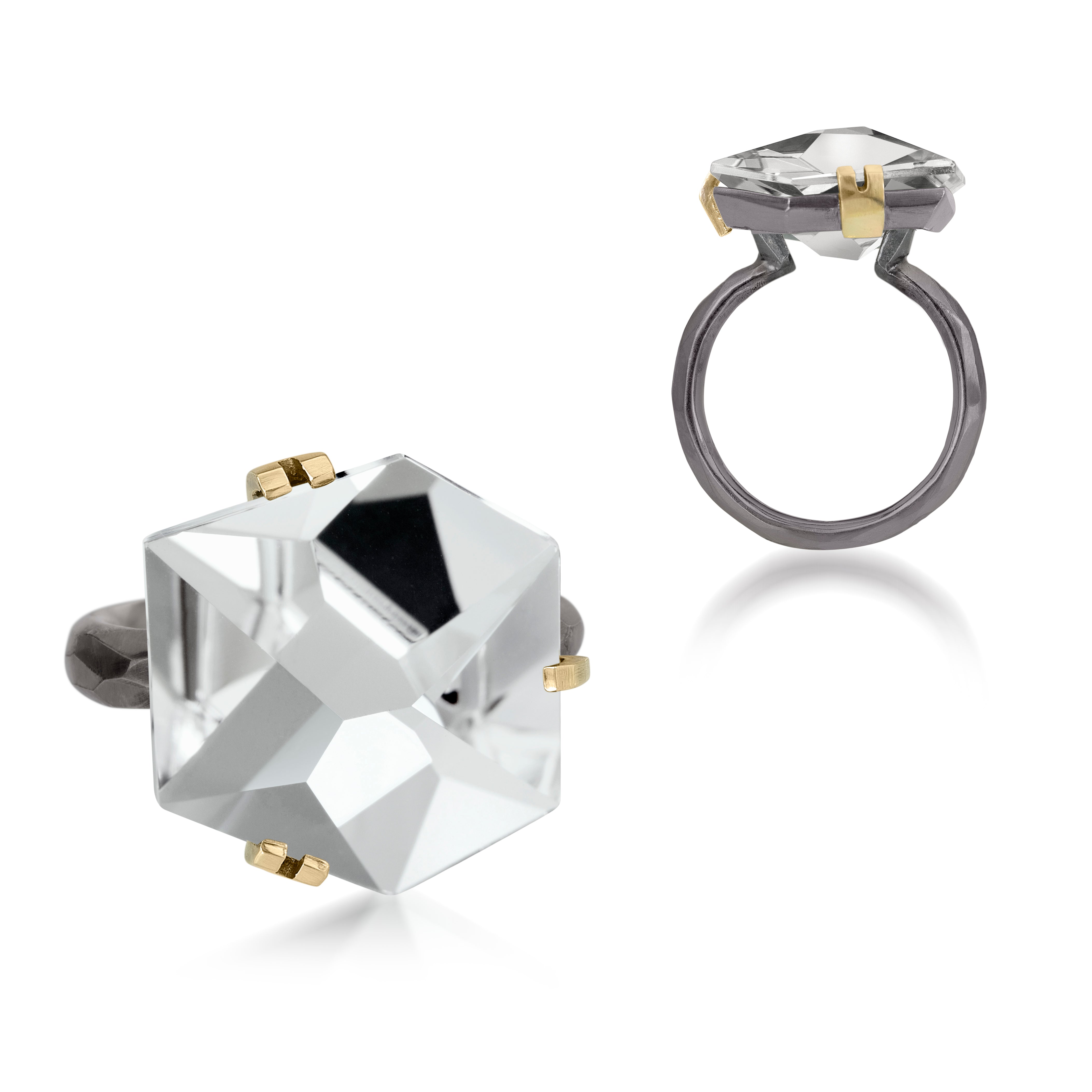 This medium size Facets ring in oxidized sterling and 18k is set with natural gemstone. Unique, hand cut faceted chunks of gemstone are prong set in 18k gold with a hand faceted oxidized silver ring shank. Gemstone 11.5-12.5 tcw.