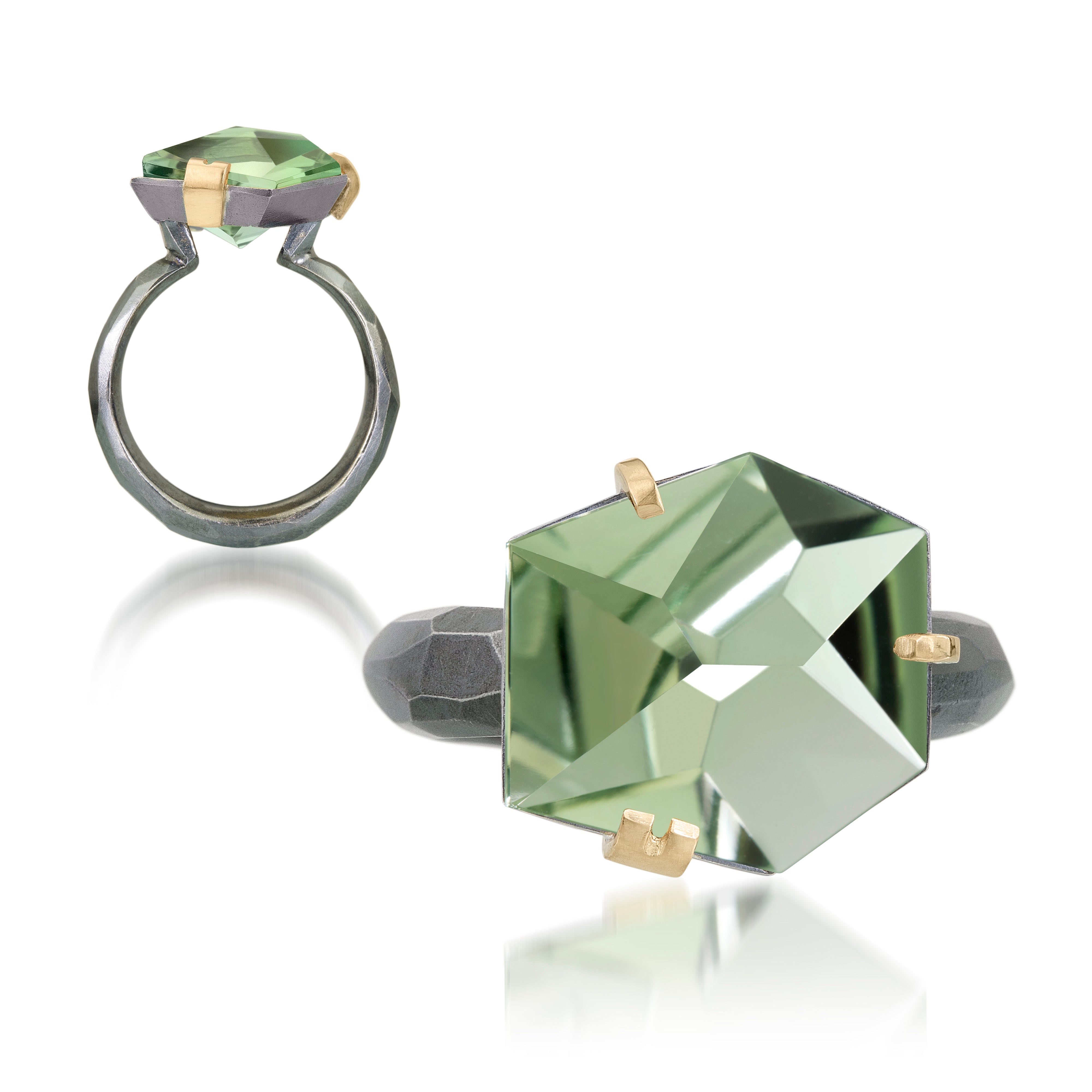 This medium size Facets ring in oxidized sterling and 18k is set with natural gemstone. Unique, hand cut faceted chunks of gemstone are prong set in 18k gold with a hand faceted oxidized silver ring shank. Gemstone 11.5-12.5 tcw.