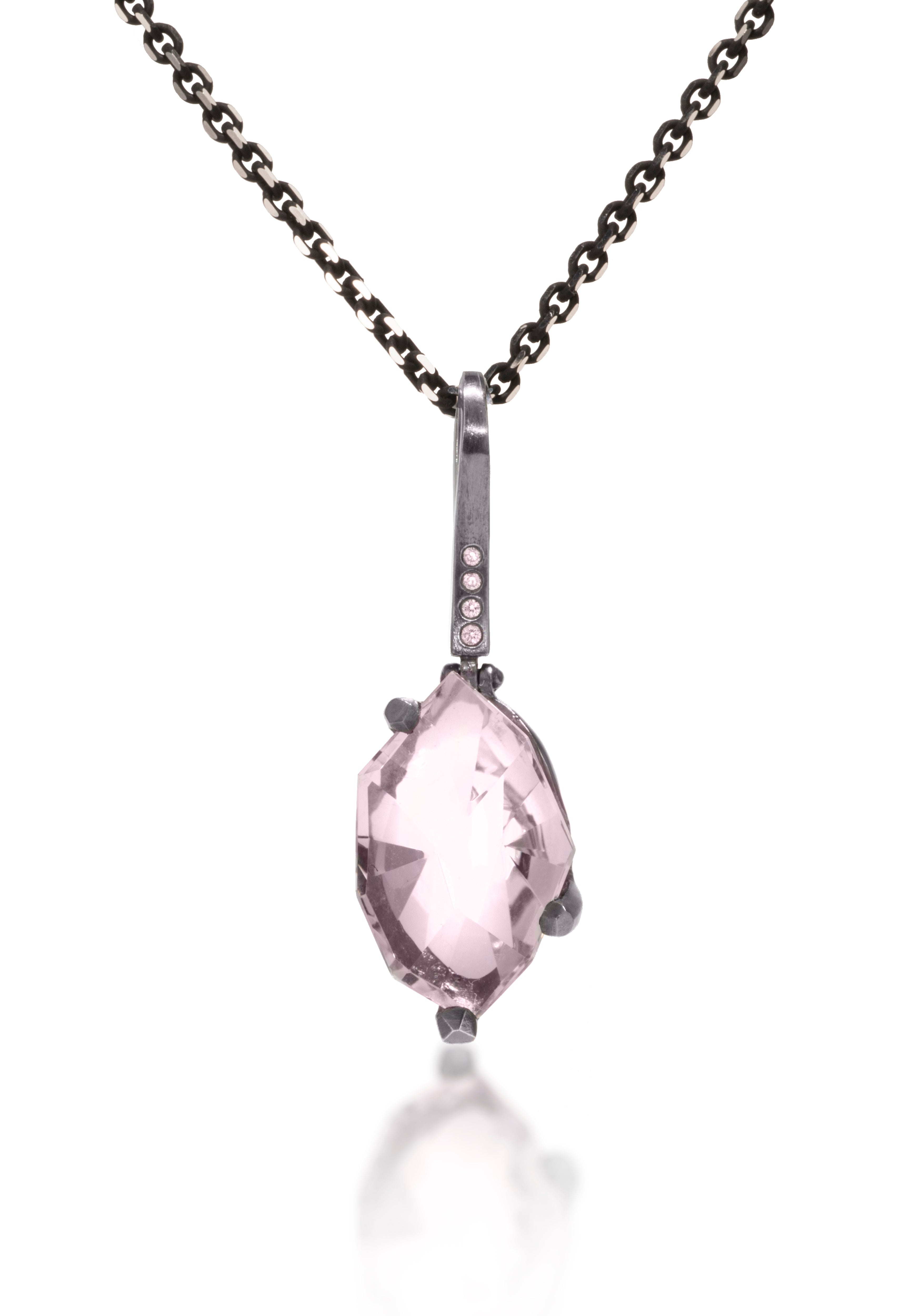 This small size Facets pendant is natural gemstone set in oxidized silver. Unique, hand cut, faceted chunks of gemstone are set in faceted prongs of oxidized silver, hanging from a small bail set with four color coordinated diamonds. Available in six color ways. Gemstone 7.0+ tcw, Dia. 0.0276 tcw.