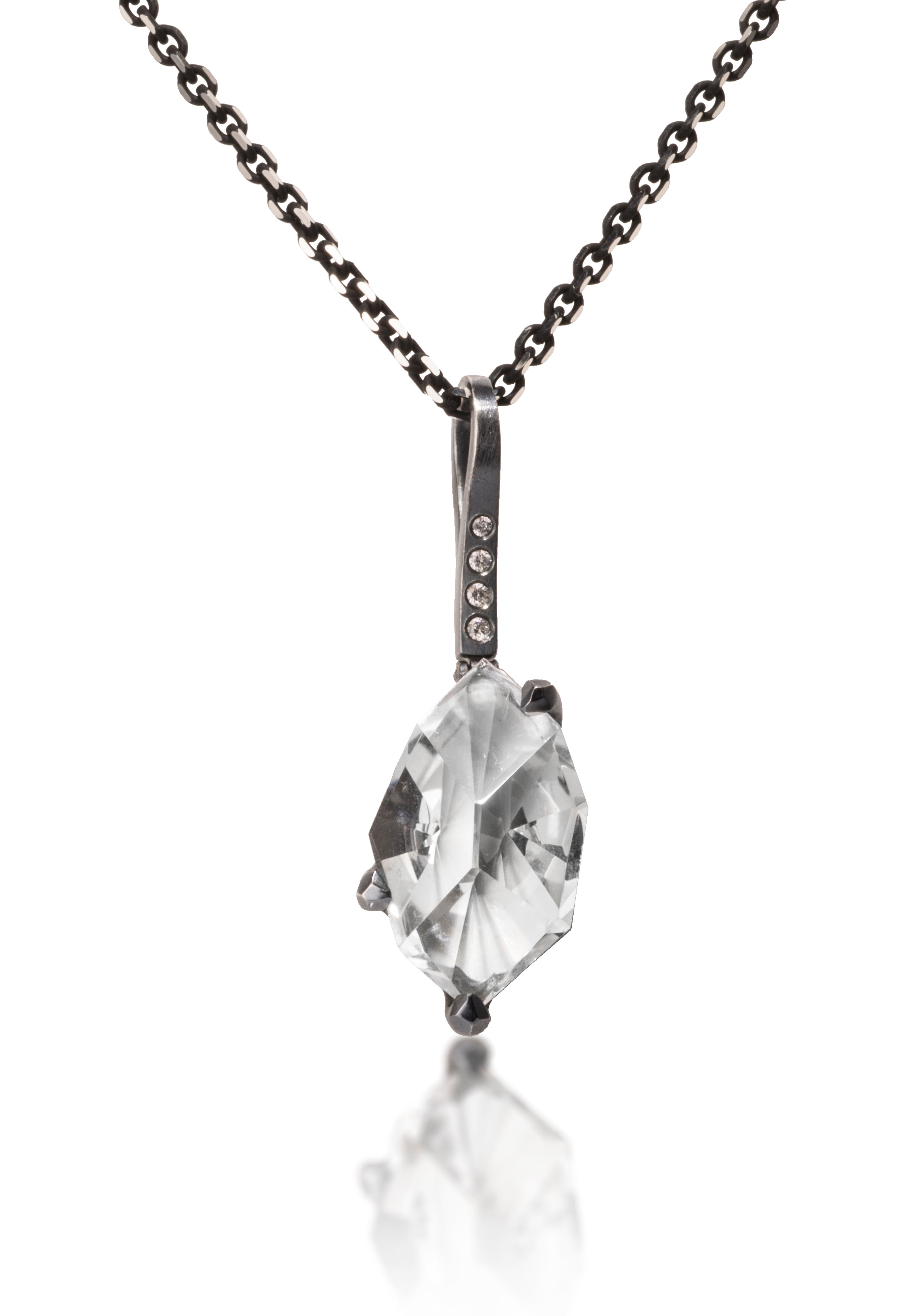 This small size Facets pendant is natural gemstone set in oxidized silver. Unique, hand cut, faceted chunks of gemstone are set in faceted prongs of oxidized silver, hanging from a small bail set with four color coordinated diamonds. Available in six color ways. Gemstone 7.0+ tcw, Dia. 0.0276 tcw.