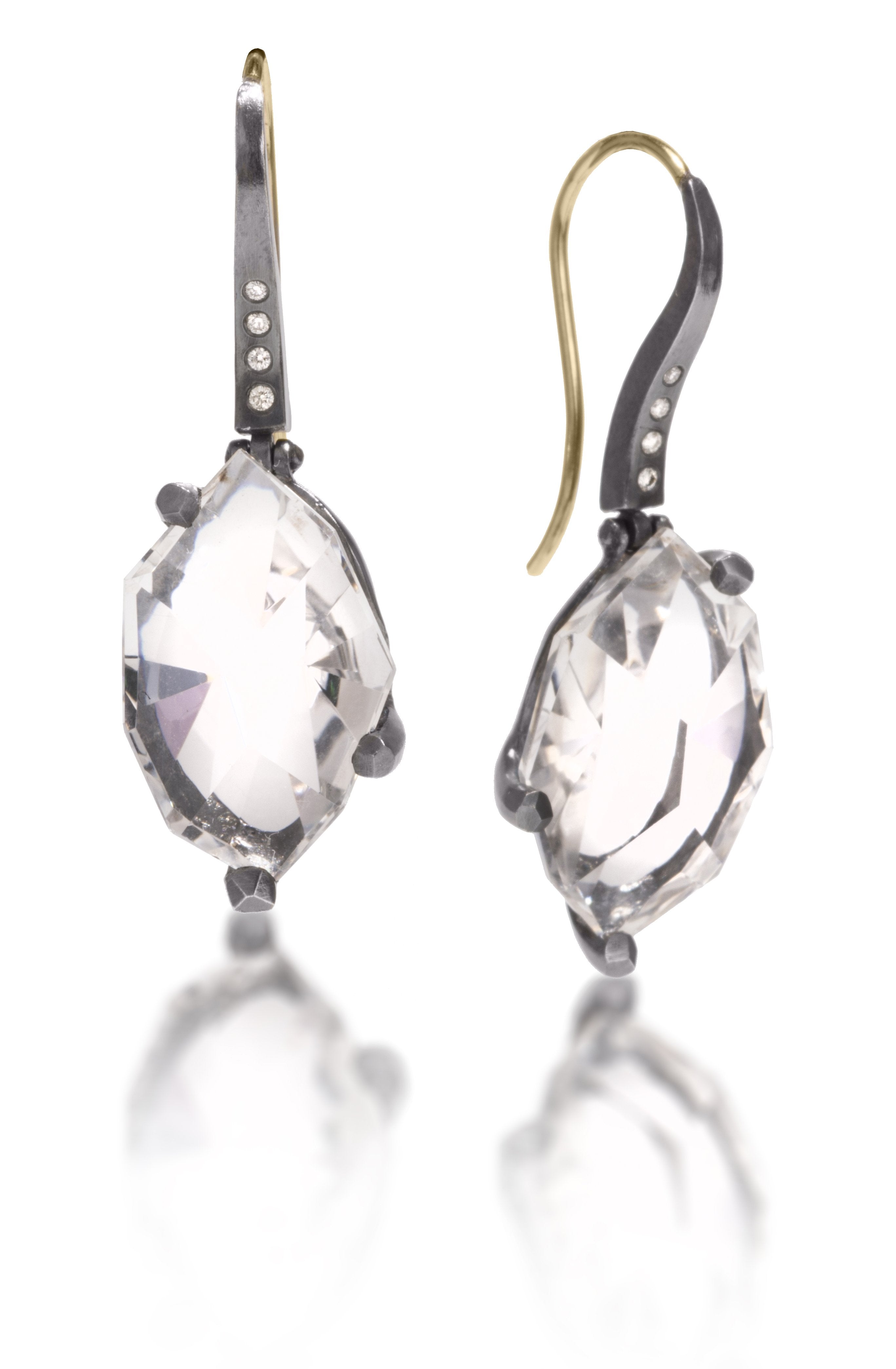 This small earring in oxidized sterling, set with unique, hand cut, faceted chunks of natural stone. Stones are set in faceted prong settings of oxidized sterling, hanging from a curved earwire set with four diamonds of corresponding color. 18k ear wires. Gemstone 15.35 tcw, Dia. 0.0584 tcw. Available in six color ways.