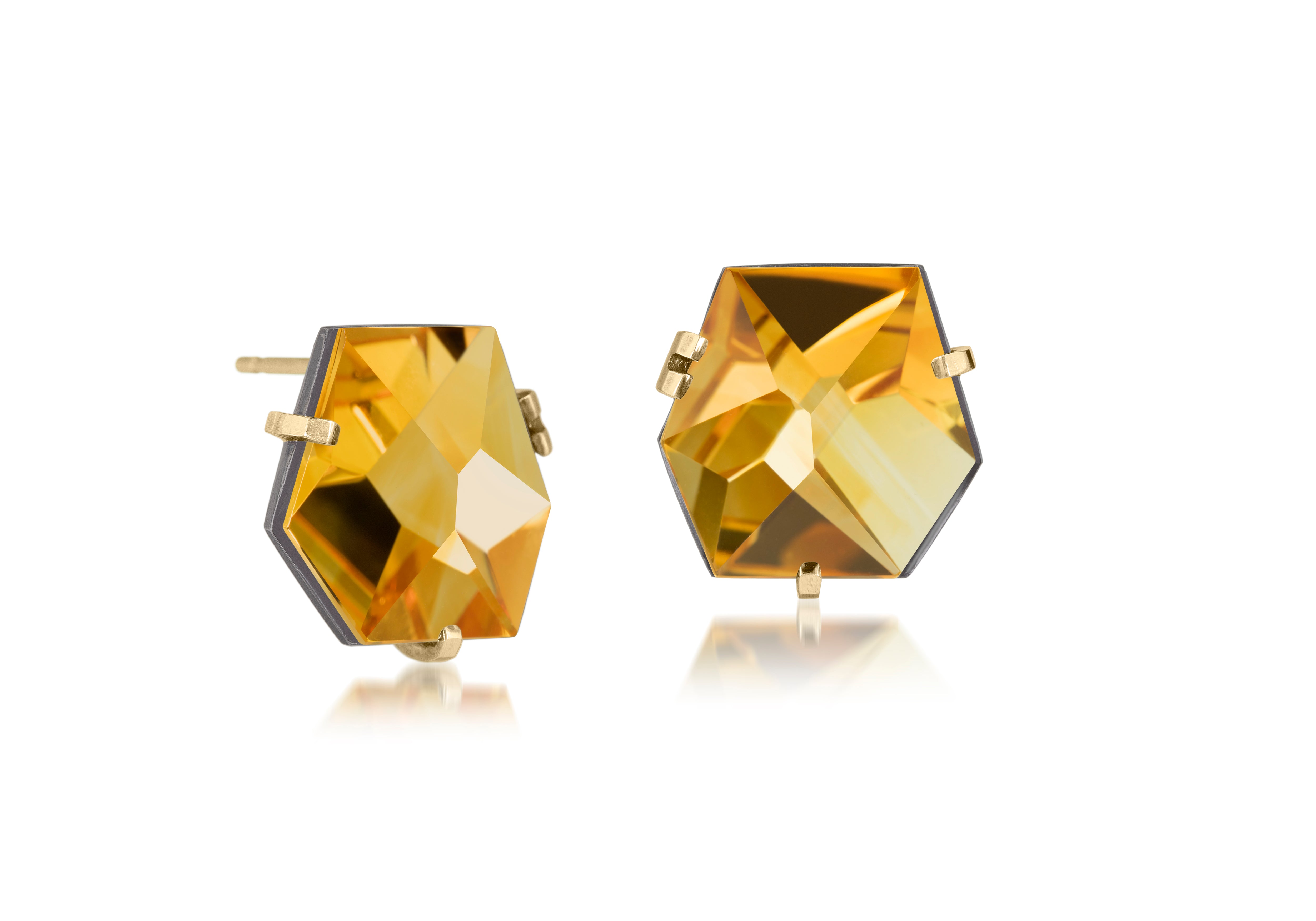 This smallest Facet earring of natural gemstone is set in oxidized sterling and 18k gold. Unique, hand cut faceted chunks of natural gem are prong set in 18k prongs with 14k posts and large backings. 17.0+ tcw.