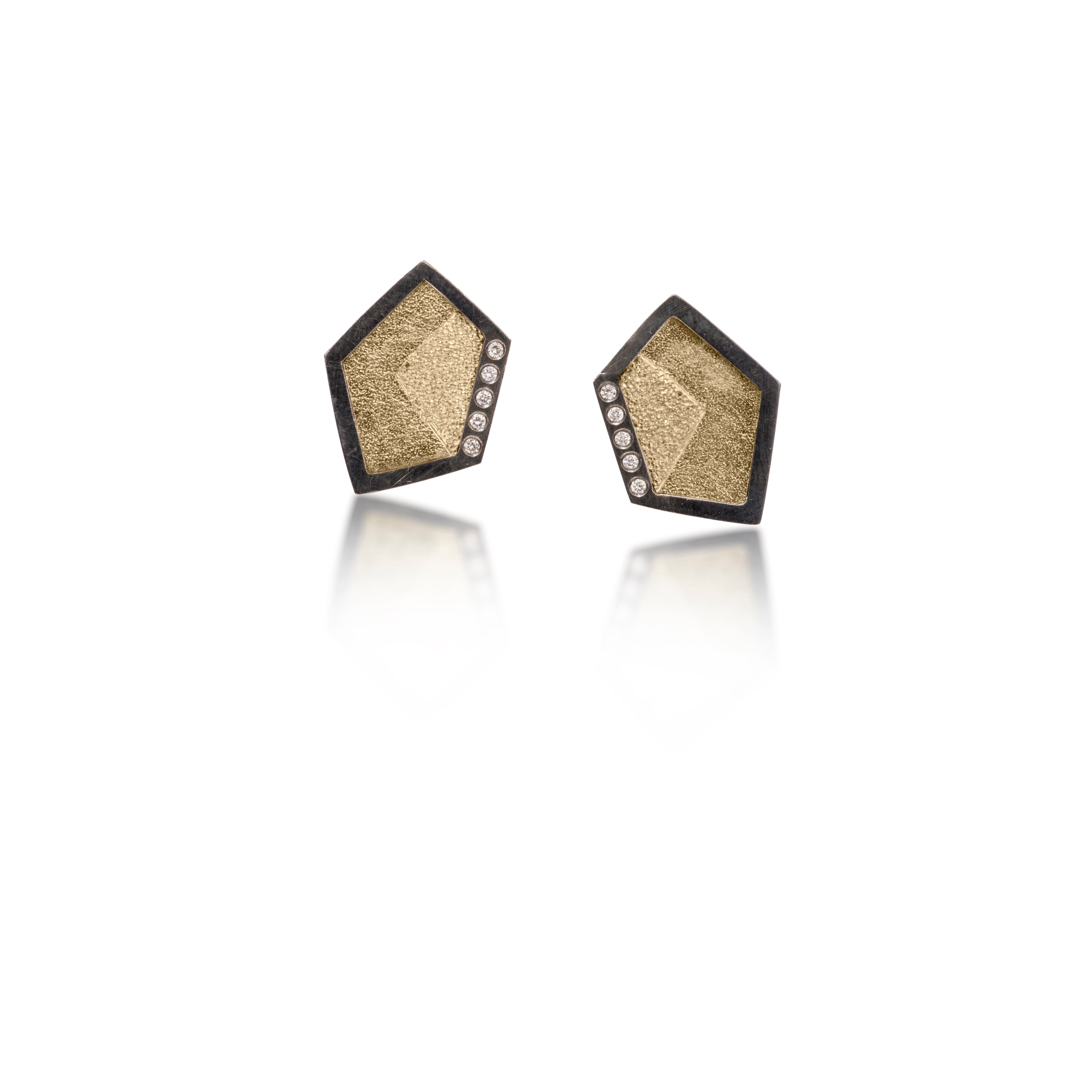 This earring in oxidized sterling silver and richly textured 18k bimetal, is flush set with ideal cut white diamonds. It features 14k gold posts. Accent facet glitters with the texture of diamond facets, individually scored and textured. Extra small size. Available as a post, drop or fringed earring. 0.069 tcw
