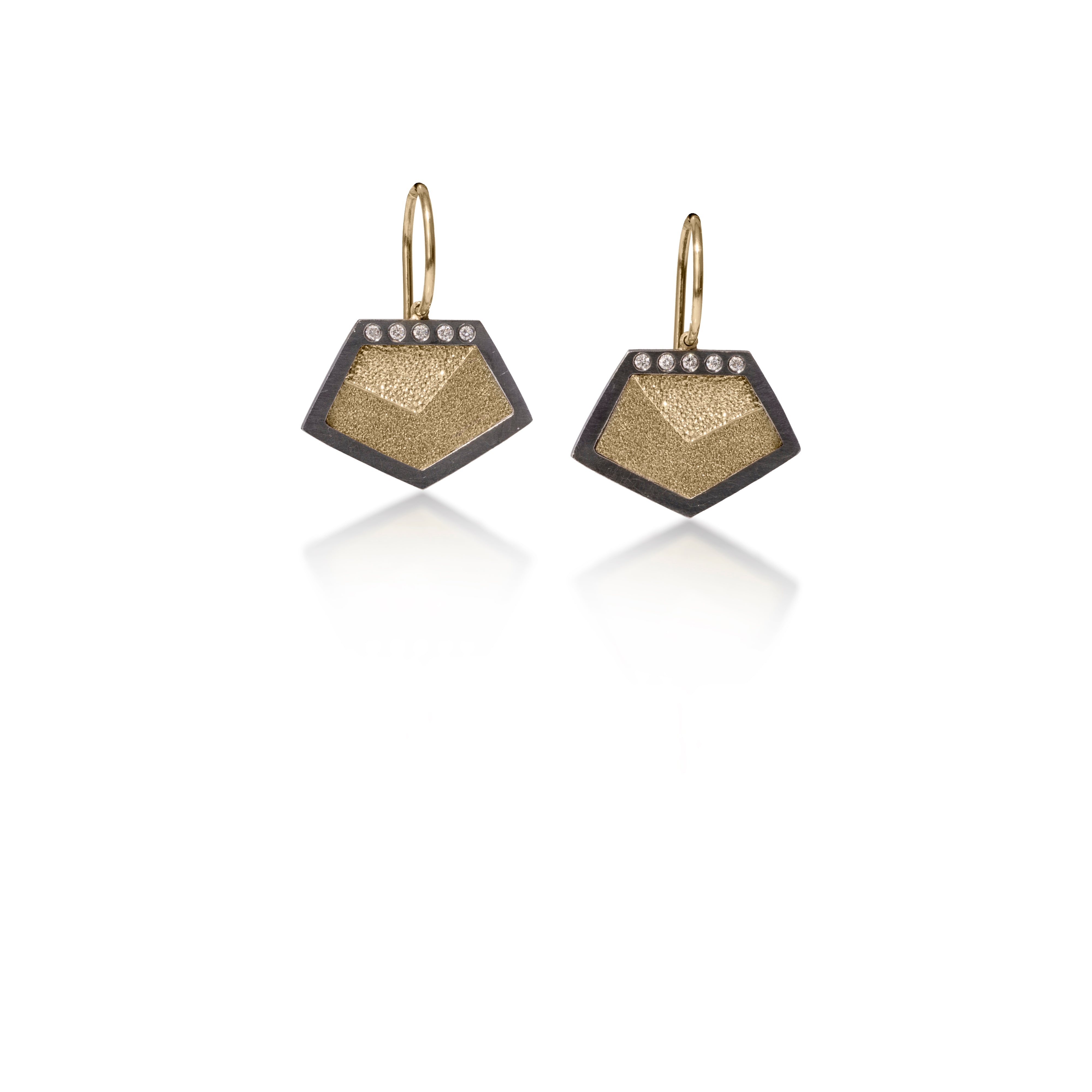 This earring in oxidized sterling silver and richly textured 18k bimetal, is flush set with ideal cut white diamonds. It features 14k gold posts. Accent facet glitters with the texture of diamond facets, individually scored and textured. Extra small size. Available as a post, drop or fringed earring. 0.069 tcw