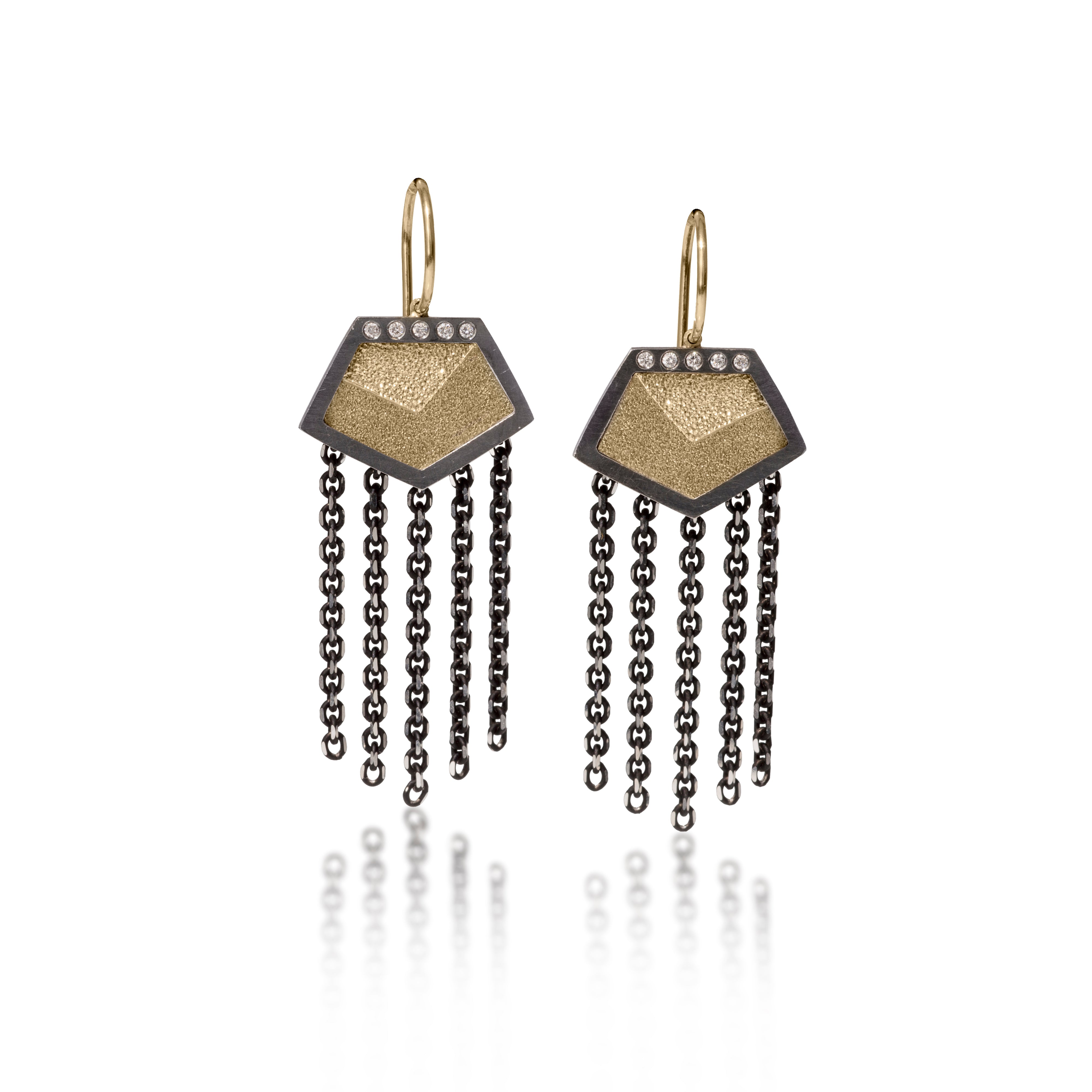 This earring in oxidized sterling silver and richly textured 18k bimetal, is flush set with ideal cut white diamonds. It features 14k gold posts. Accent facet glitters with the texture of diamond facets, individually scored and textured. Extra small size. Available as a post, drop or fringed earring. 0.069 tcw