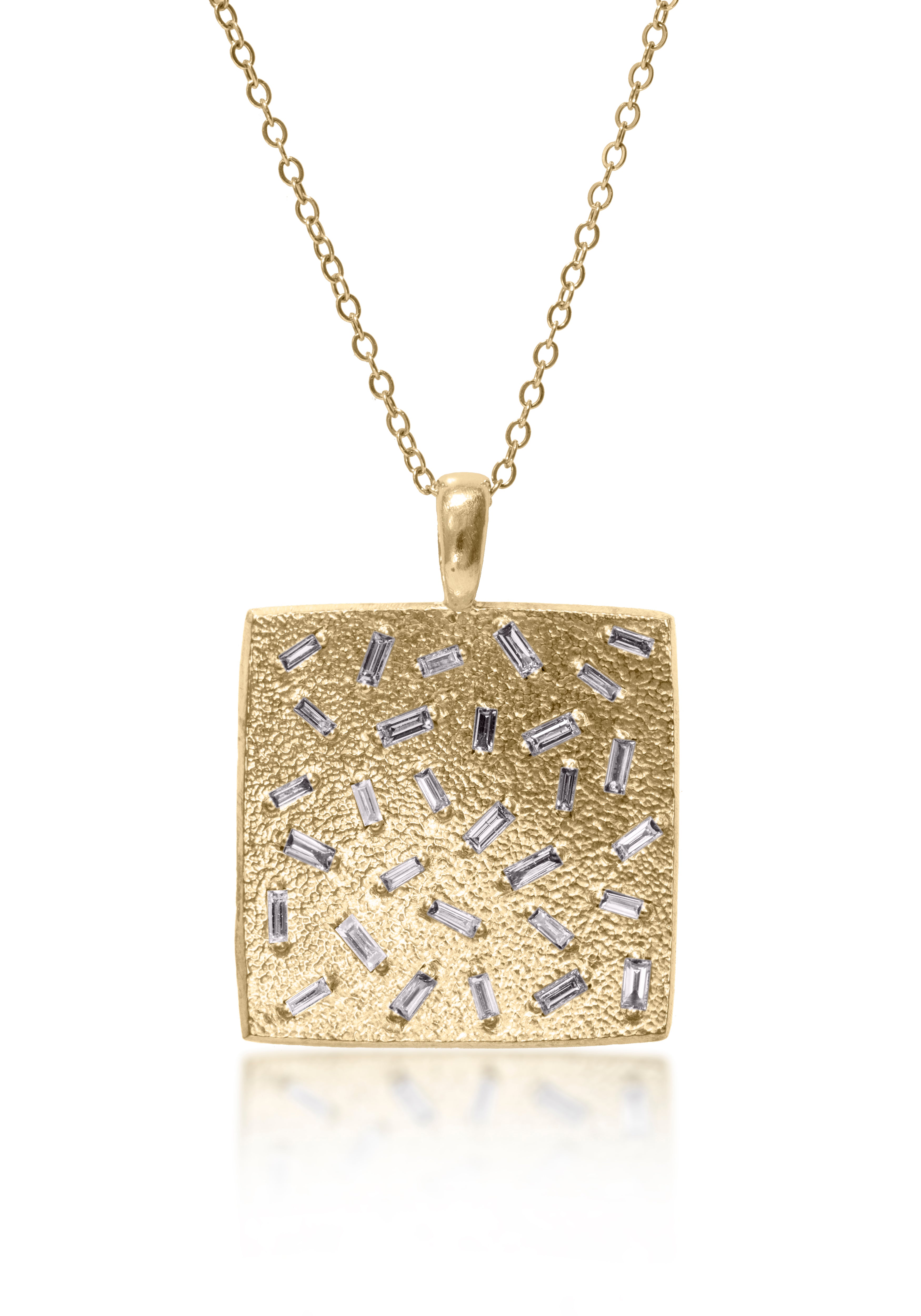 This larger square pendant features a stunning 30 white diamond baguettes. Richly textured, generous bail fits a wide range of chains. Available in three color ways, oxidized silver, 18k gold and palladium. Price includes pendant only. 0.824 tcw.