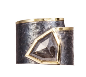 This simple, yet distinctive, one of kind ring in 18k gold and oxidized silver features a large, angular cut, bezel set, center diamond, 1.65 tcw.  It is forged, textured and fabricated by hand.  