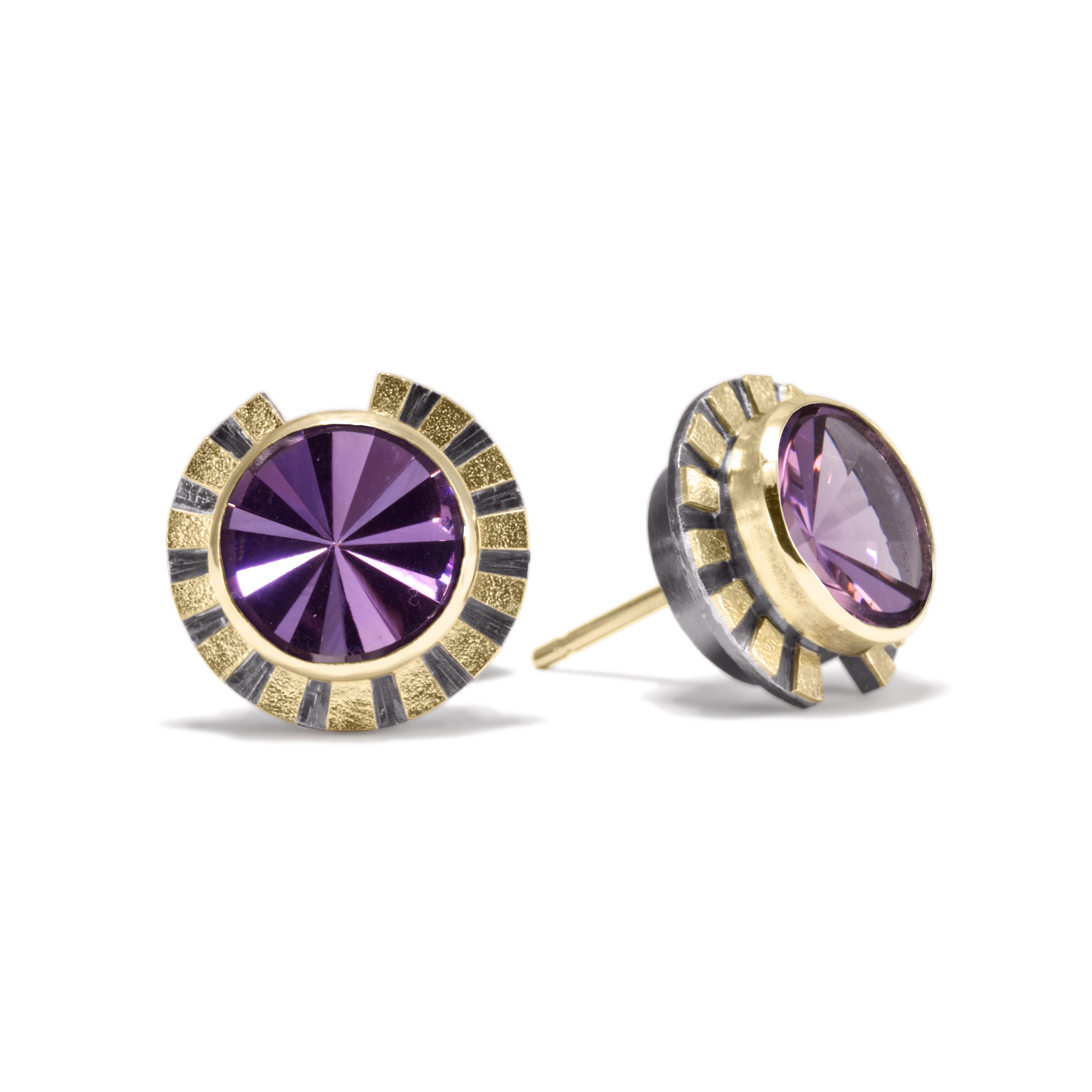 This is the refined and dazzling Striped Earring #1. Made in 18k gold and oxidized sterling silver, the design features a bezel set, radial cut, semiprecious center stone. Hand fabricated, stipple textured and engraved mixed metals.  Available in seven color ways, with 14k gold posts.