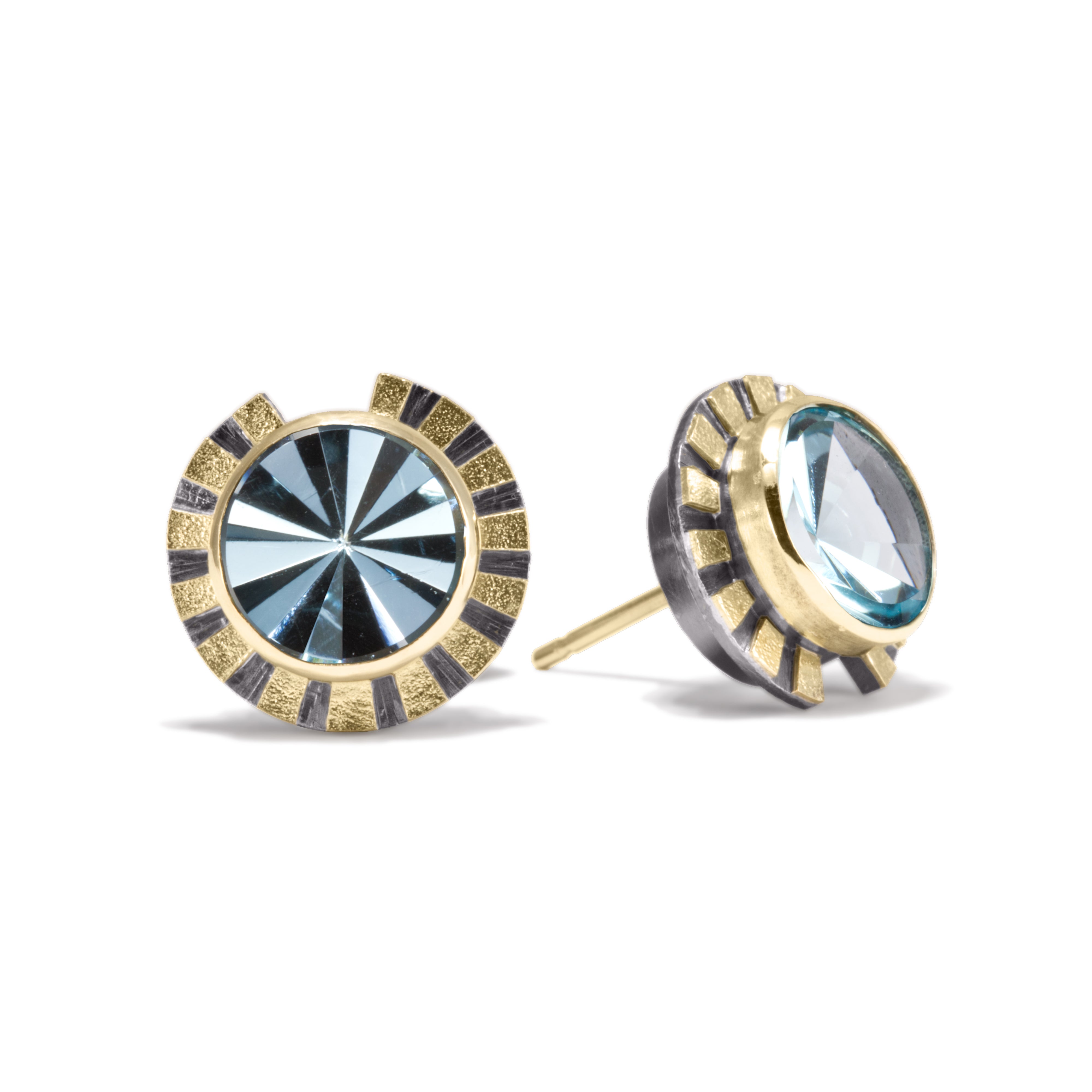 This is the refined and dazzling Striped Earring #1. Made in 18k gold and oxidized sterling silver, the design features a bezel set, radial cut, semiprecious center stone. Hand fabricated, stipple textured and engraved mixed metals.  Available in seven color ways, with 14k gold posts.