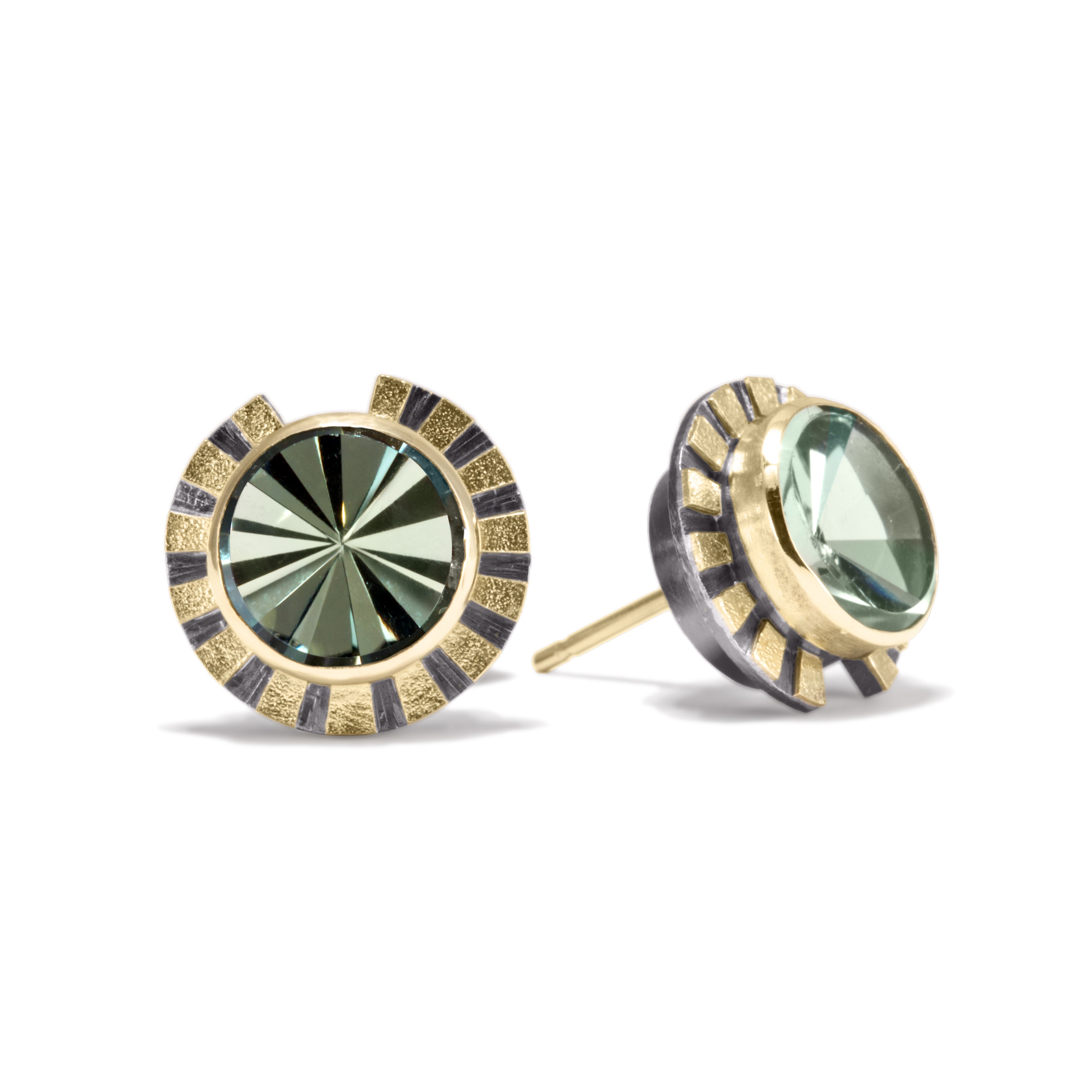 This is the refined and dazzling Striped Earring #1. Made in 18k gold and oxidized sterling silver, the design features a bezel set, radial cut, semiprecious center stone. Hand fabricated, stipple textured and engraved mixed metals.  Available in seven color ways, with 14k gold posts.