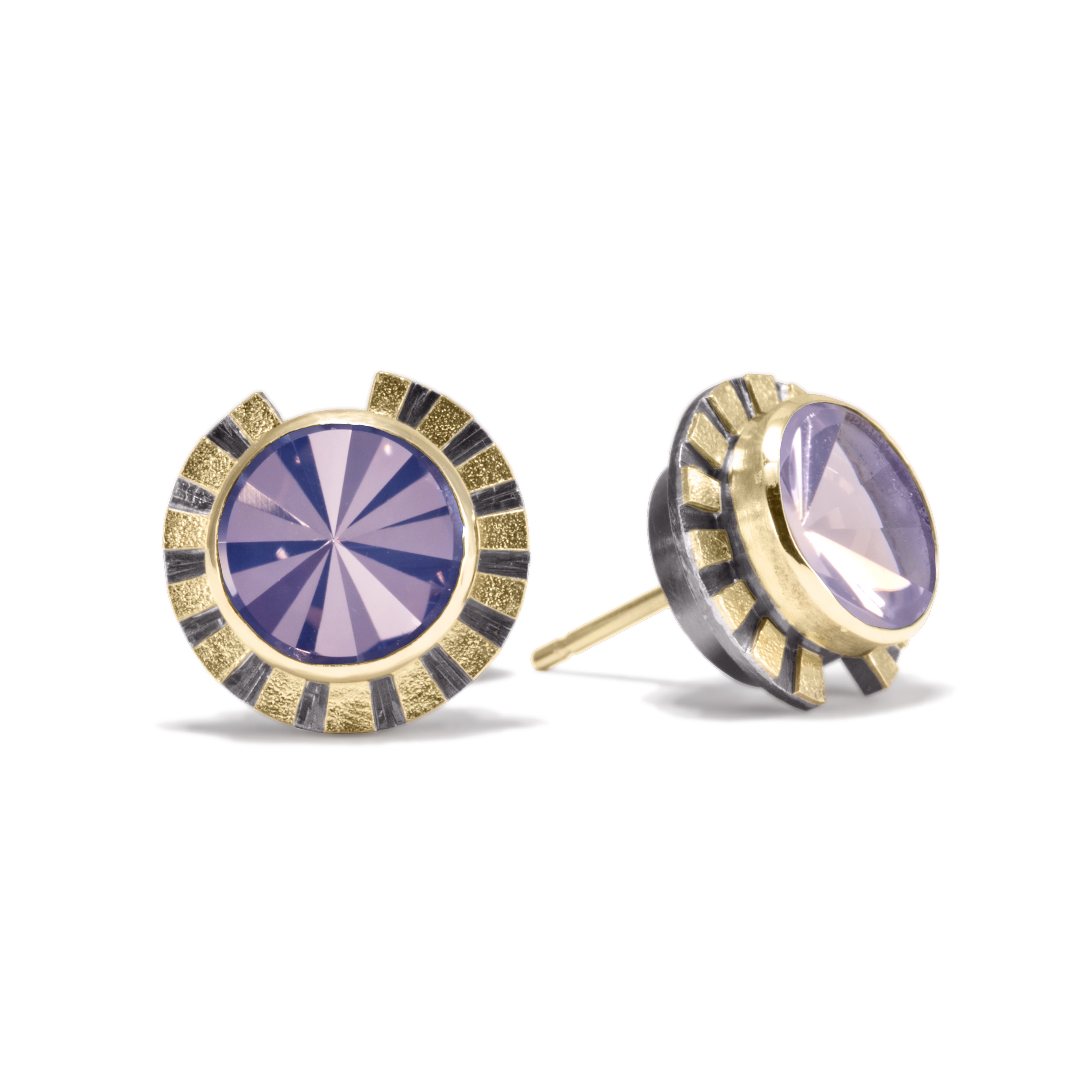 This is the refined and dazzling Striped Earring #1. Made in 18k gold and oxidized sterling silver, the design features a bezel set, radial cut, semiprecious center stone. Hand fabricated, stipple textured and engraved mixed metals.  Available in seven color ways, with 14k gold posts.