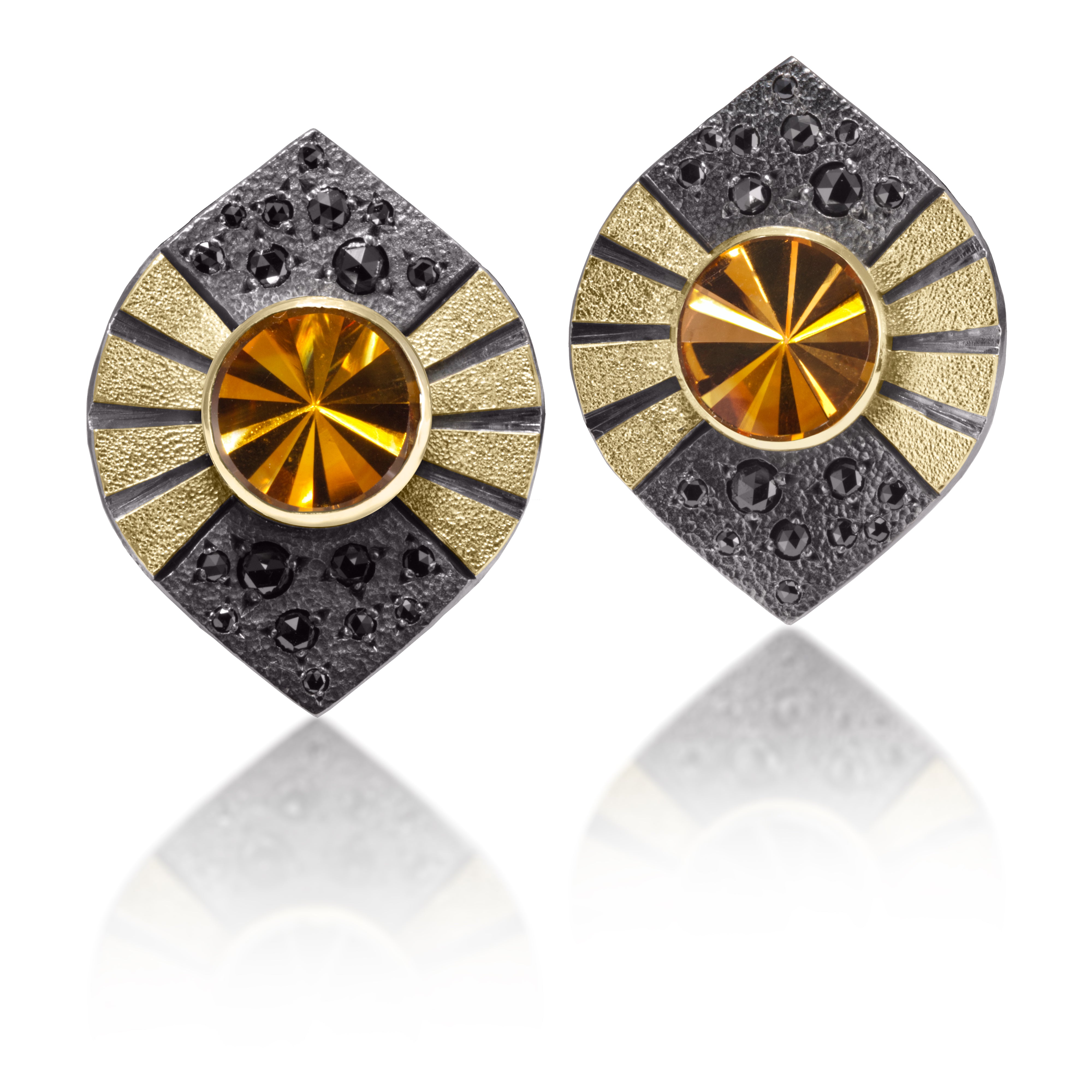 Stripe Earring #3 is a gently curved form in 18k gold and oxidized sterling silver, which features a bezel set, radial cut, semiprecious center stone. Hand fabricated, stipple textured and engraved mixed metals. Bead set, rose cut, black diamonds 0.936 tcw., add a secret shimmer to contrasting areas of oxidized sterling. 14k gold posts.