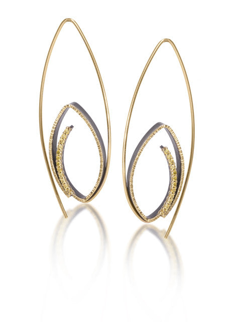 Tempest Earring #1 in 18k gold and oxidized sterling silver with prong set natural yellow diamonds. Forged, textured and fabricated by hand. 0.1728 tcw.