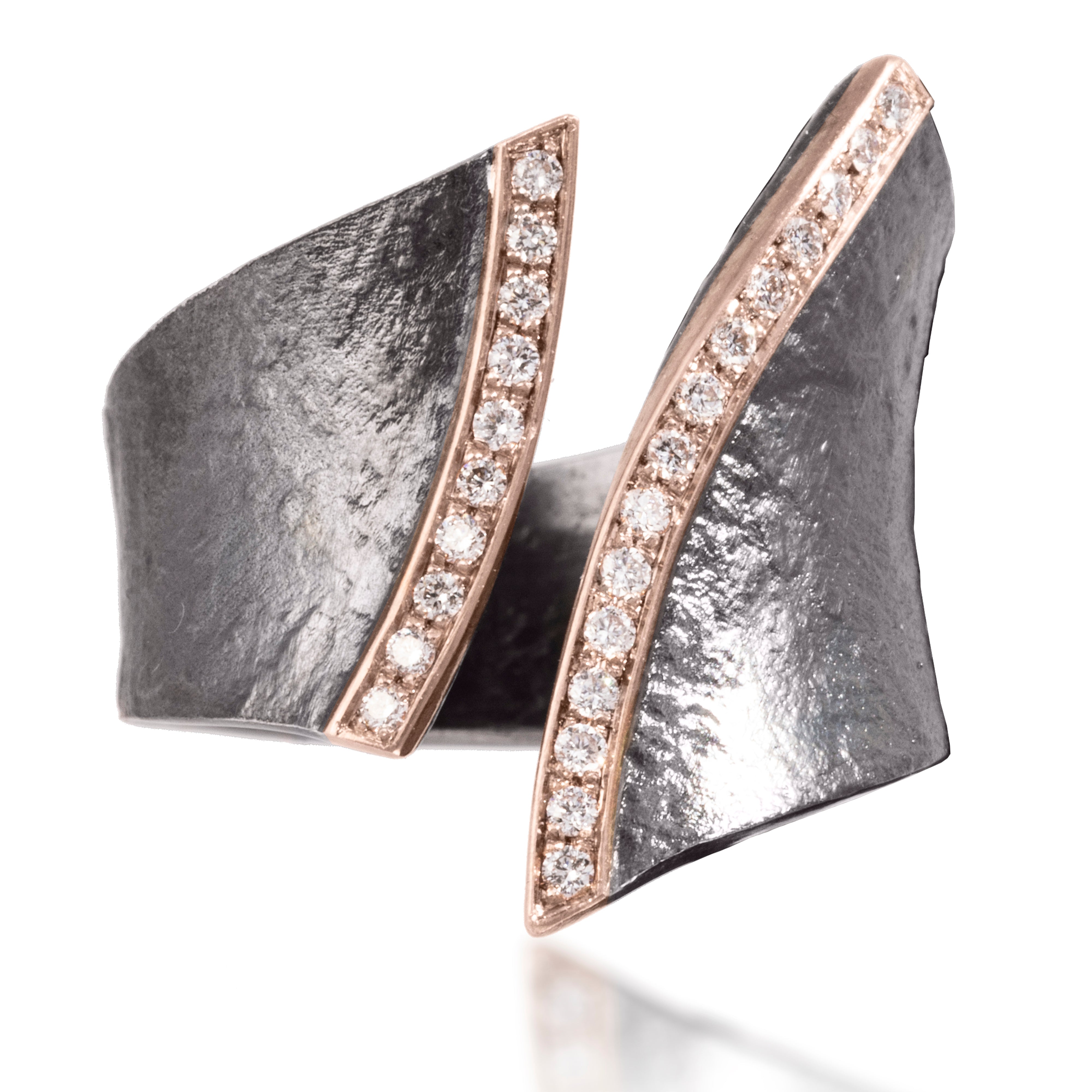 A fresh, modern classic combining earthy textured metals with true bright cut pavé. Hand forged and fabricated in 18k rose gold and oxidized sterling silver with pavé set white diamonds. As shown, 0.166 tcw. | Elizabeth Garvin Fine