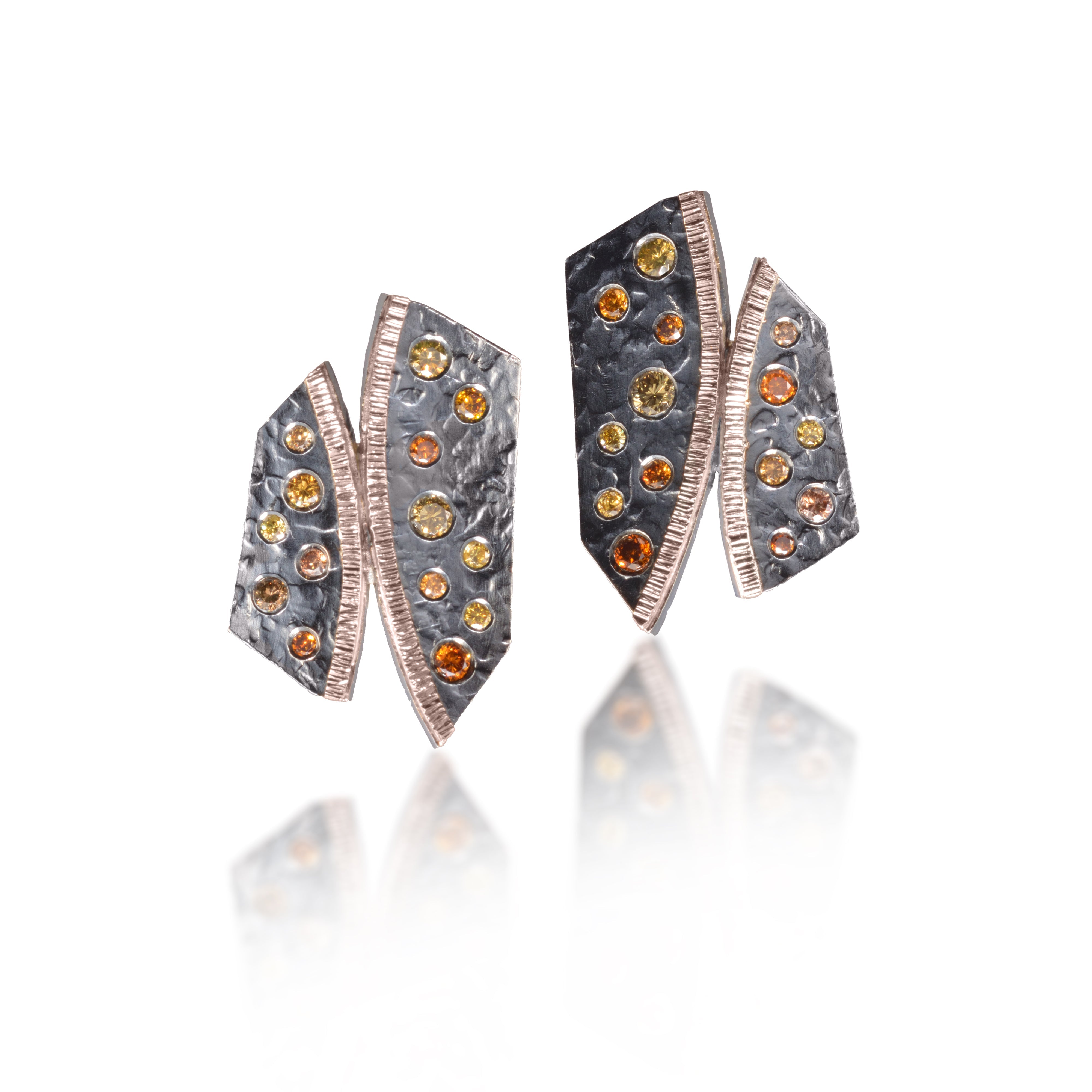 Cyclone E10 Earring, 18k rose gold and oxidized sterling silver; flush set with natural diamonds. Hand fabricated, asymmetric, hammer texture. 14k posts | Elizabeth Garvin Fine Jewelry