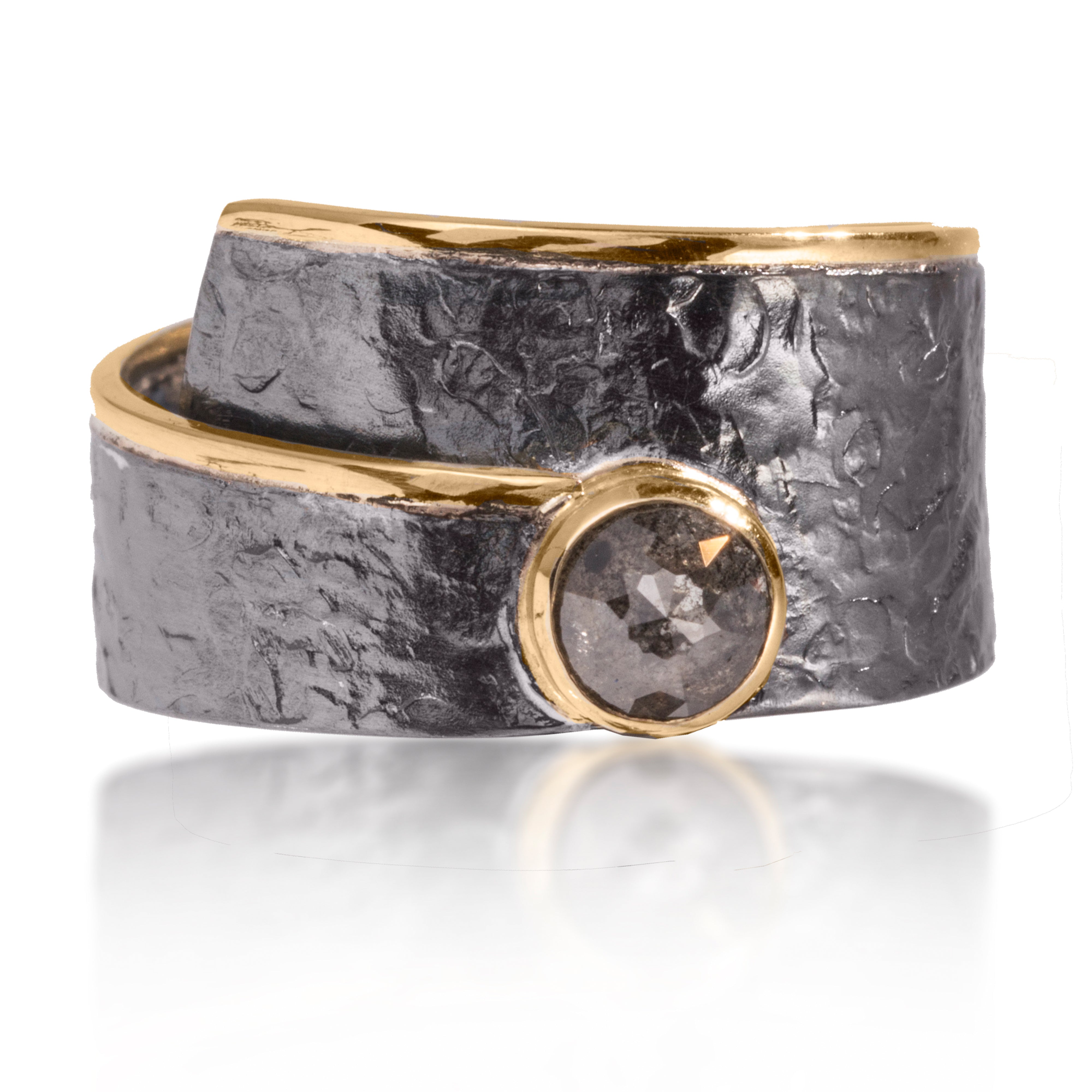 This simple and elegant Cyclone Ring is made of 18k gold and oxidized silver with a bezel set center rose cut, opaque diamond. Hand fabricated, hammer textured. Available in various widths, colors and cuts. 0.28- 0.33 tcw.