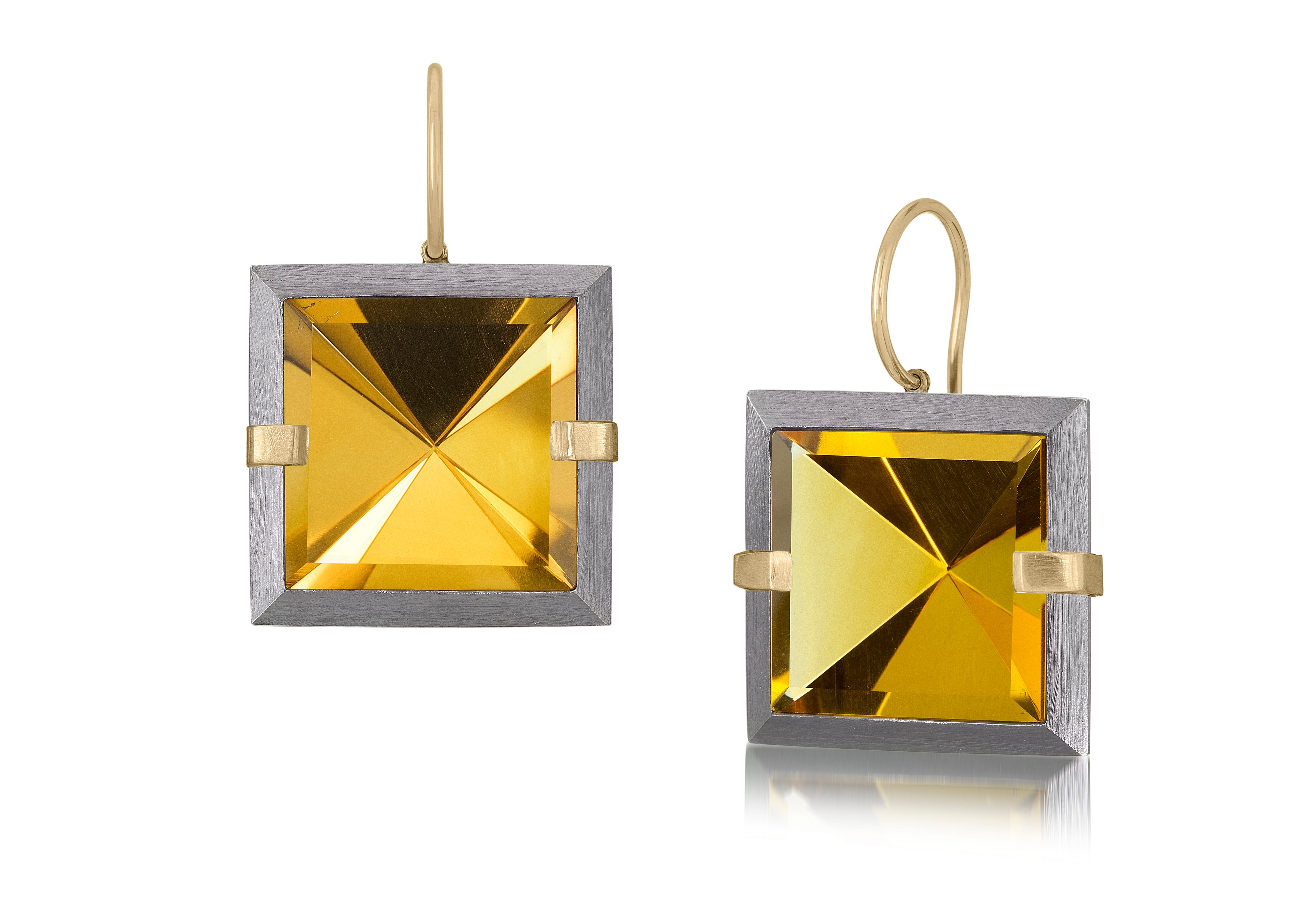 This large style Facets drop earring is natural gemstone set in oxidized silver and 18k gold. Crisp and sparkling faceted squares of natural stone are accented with 18k gold prongs and hang from 18k gold ear wires. 18.8+ tcw.