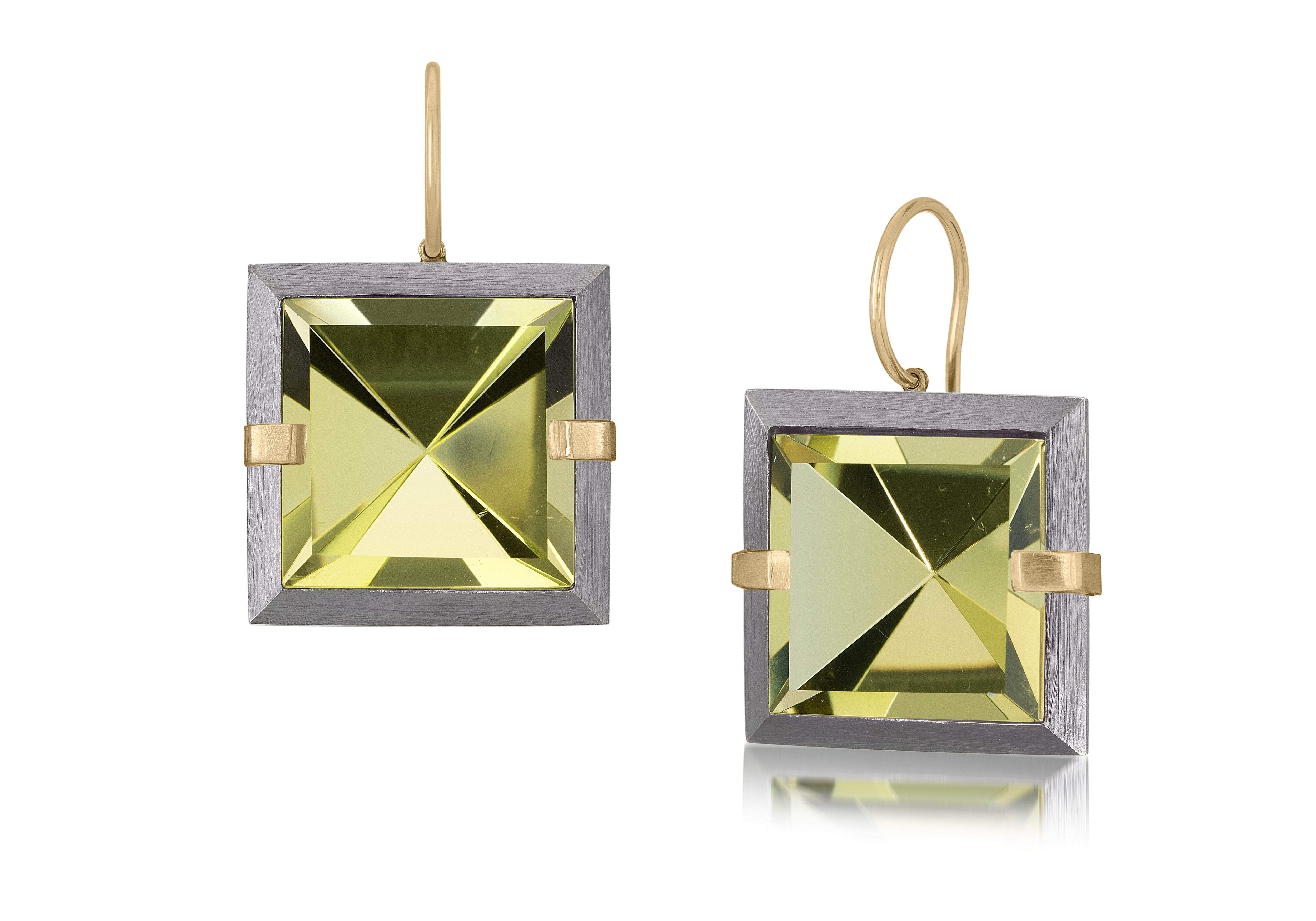 This large style Facets drop earring is natural gemstone set in oxidized silver and 18k gold. Crisp and sparkling faceted squares of natural stone are accented with 18k gold prongs and hang from 18k gold ear wires. 18.8+ tcw.