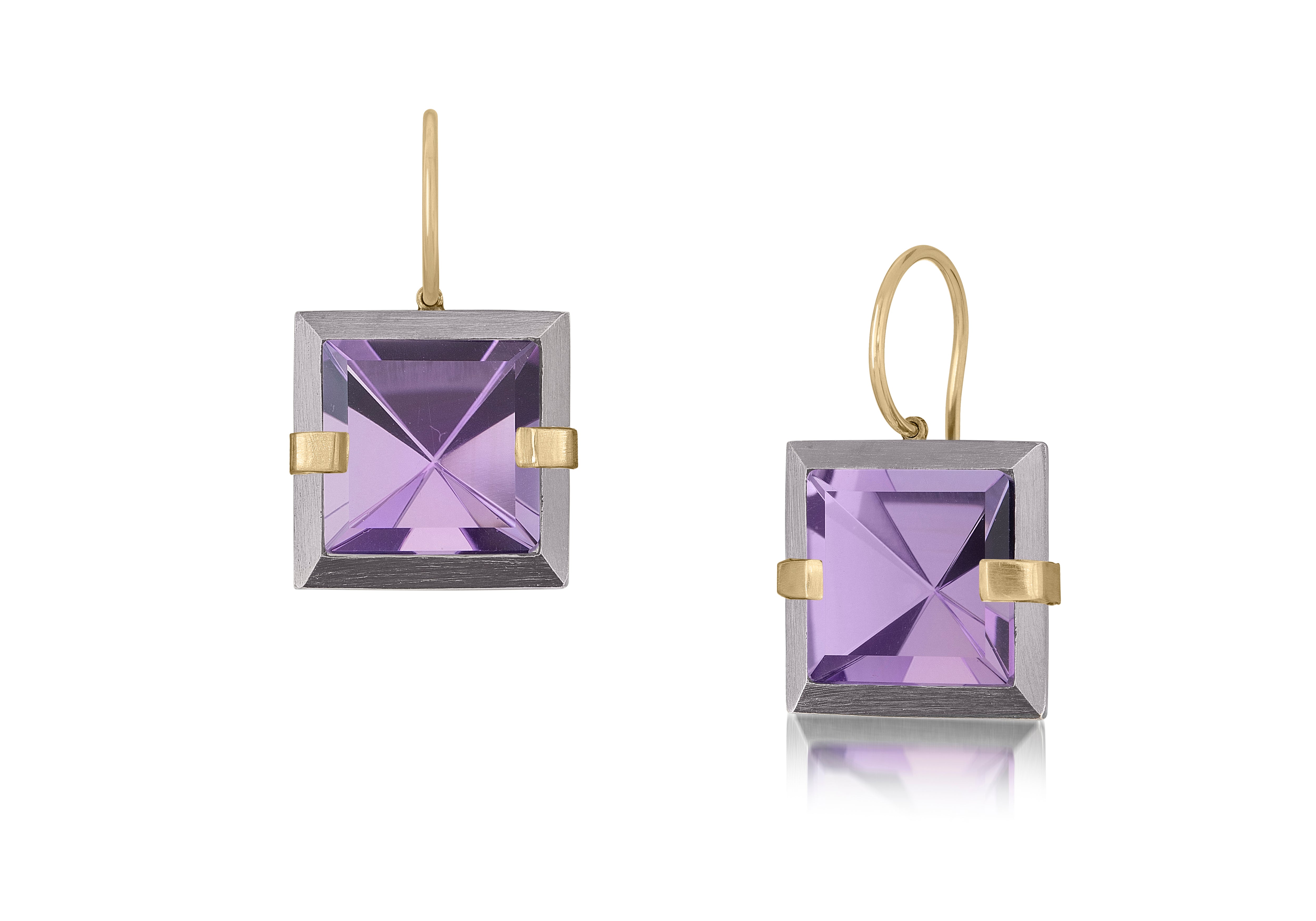 This small style Facets drop earring is natural gemstone set in oxidized sterling and 18k gold. Crisp and sparkling faceted squares of natural stone are accented with 18k gold prongs and hang from 18k gold ear wires. 7.46+ tcw.