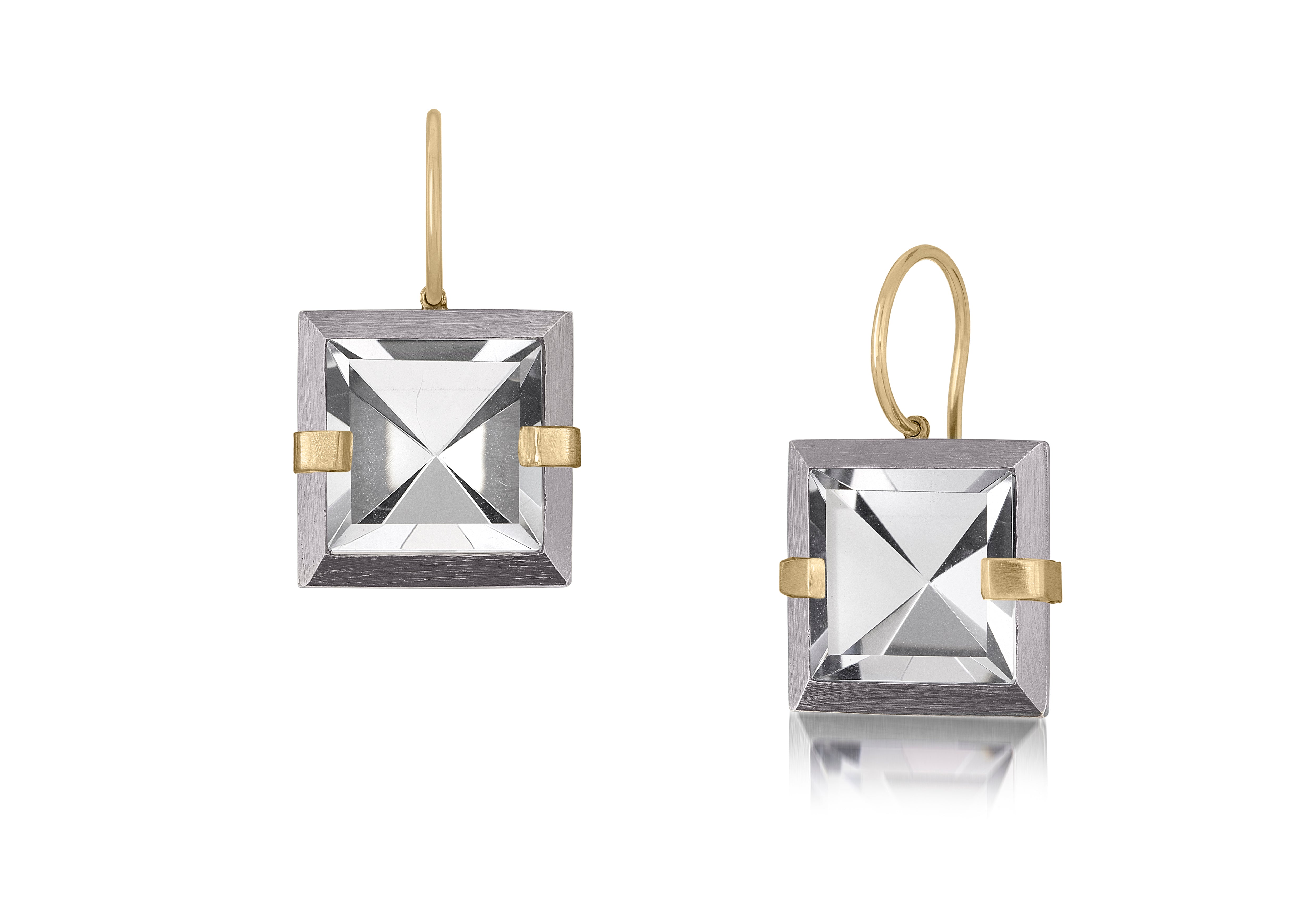 This small style Facets drop earring is natural gemstone set in oxidized sterling and 18k gold. Crisp and sparkling faceted squares of natural stone are accented with 18k gold prongs and hang from 18k gold ear wires. 7.46+ tcw.