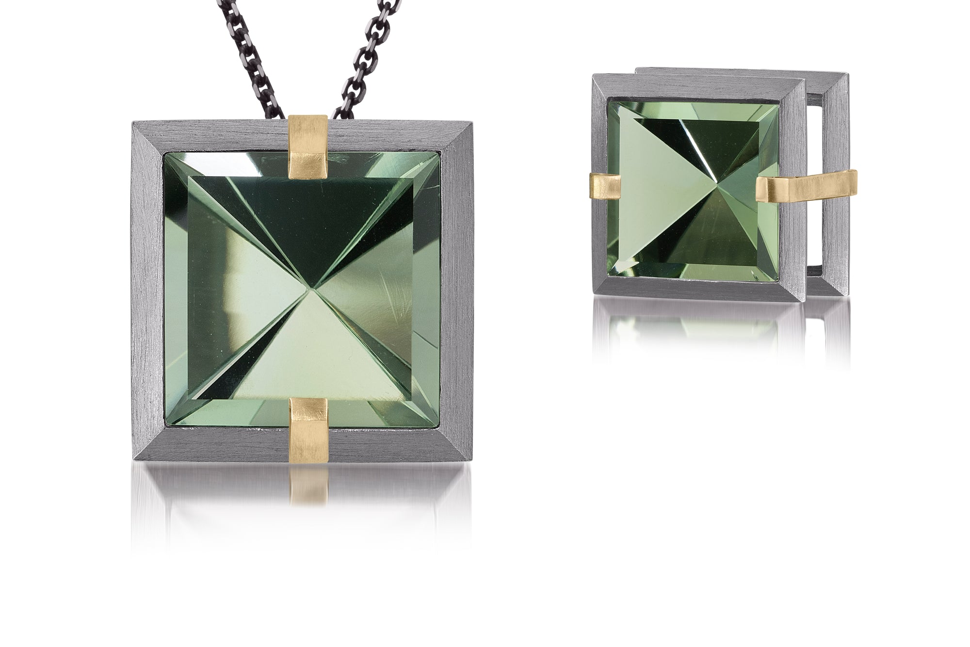 This large Facets slide pendant in oxidized sterling and 18k gold is set with natural gemstone. Crisp, hand cut, faceted gemstones are set in a square two level frame of oxidized silver, accented by 18k gold prongs. 9.29+ tcw.