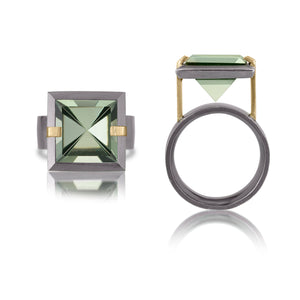 This medium style Facets ring is natural gemstone set in oxidized sterling and 18k gold. Crisp and sparkling faceted squares of gemstone are elevated and framed in oxidized silver accented with 18k gold prongs.  The ring features an oxidized sterling comfort band.  Gemstone 6.32- 7.28 tcw.