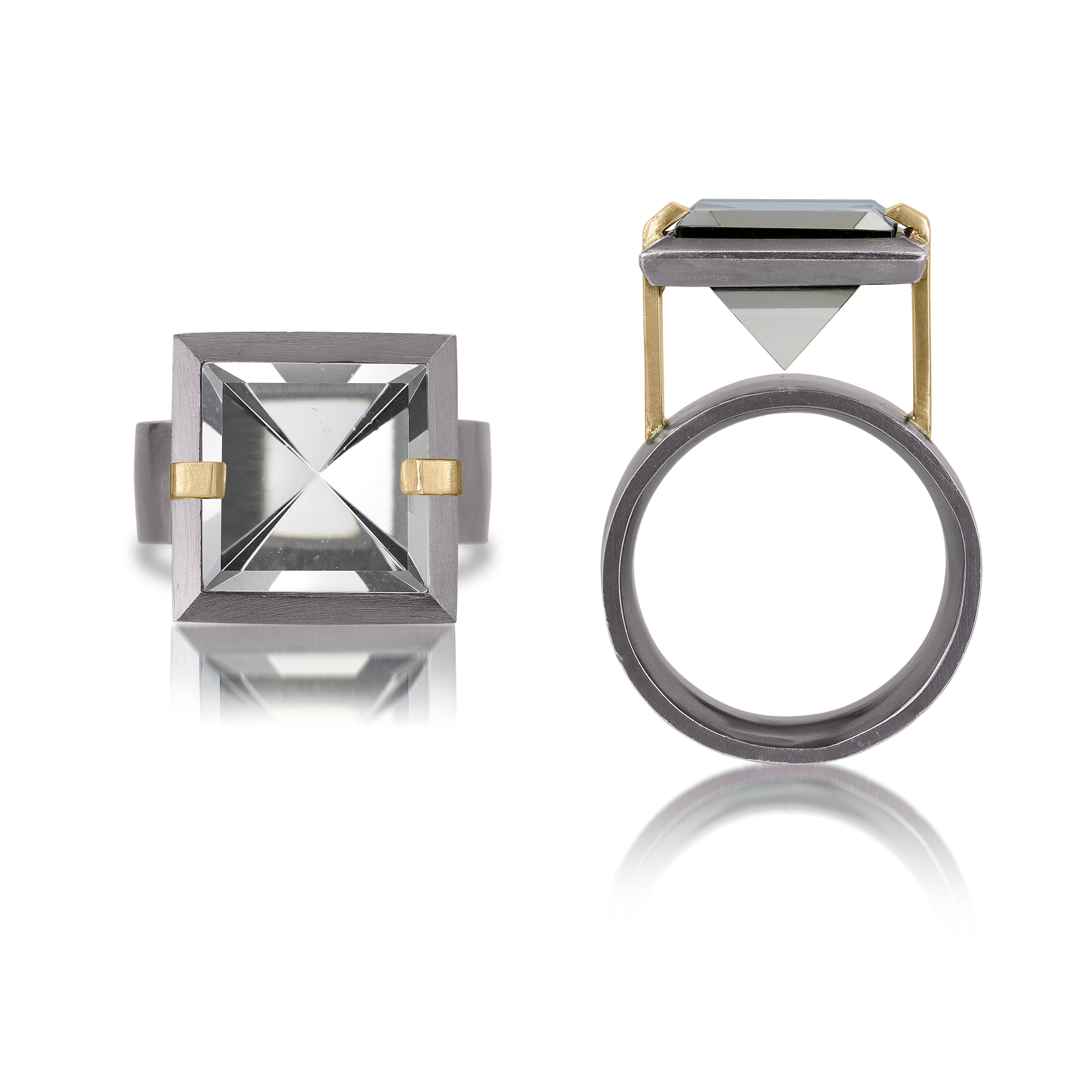 This medium style Facets ring is natural gemstone set in oxidized sterling and 18k gold. Crisp and sparkling faceted squares of gemstone are elevated and framed in oxidized silver accented with 18k gold prongs.  The ring features an oxidized sterling comfort band.  Gemstone 6.32- 7.28 tcw.