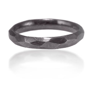This simple ring is hand faceted and plays nicely with others.  Great alone or stacked, the facets dance in the light.  Simplicity with an interesting twist.  Available in four color ways, oxidized silver, 18k gold, palladium or platinum.