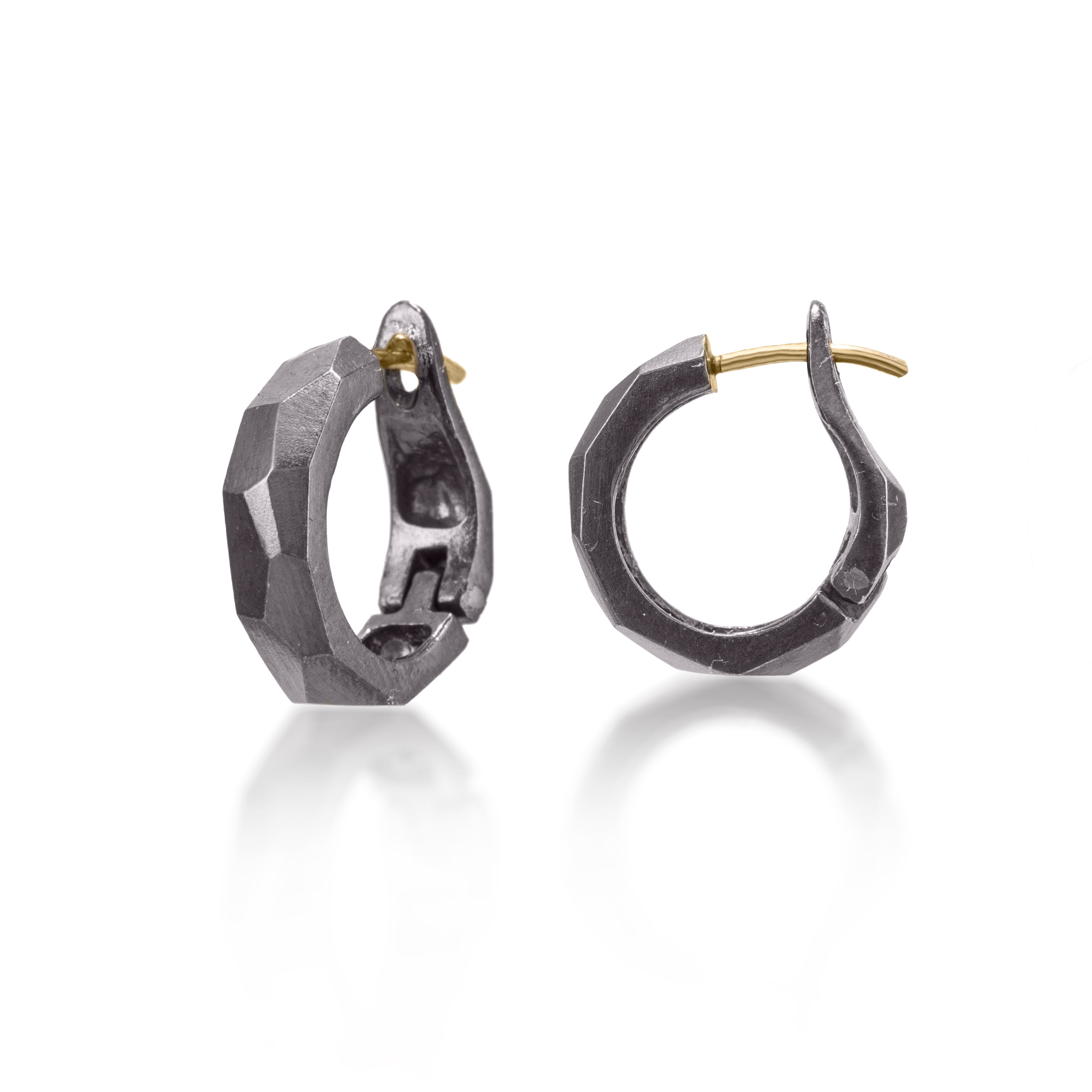 Chunky little huggie hoops, crisply hand faceted in four color ways, oxidized silver, 18k gold, palladium or platinum. 18k ear posts and a satisfying click closer.