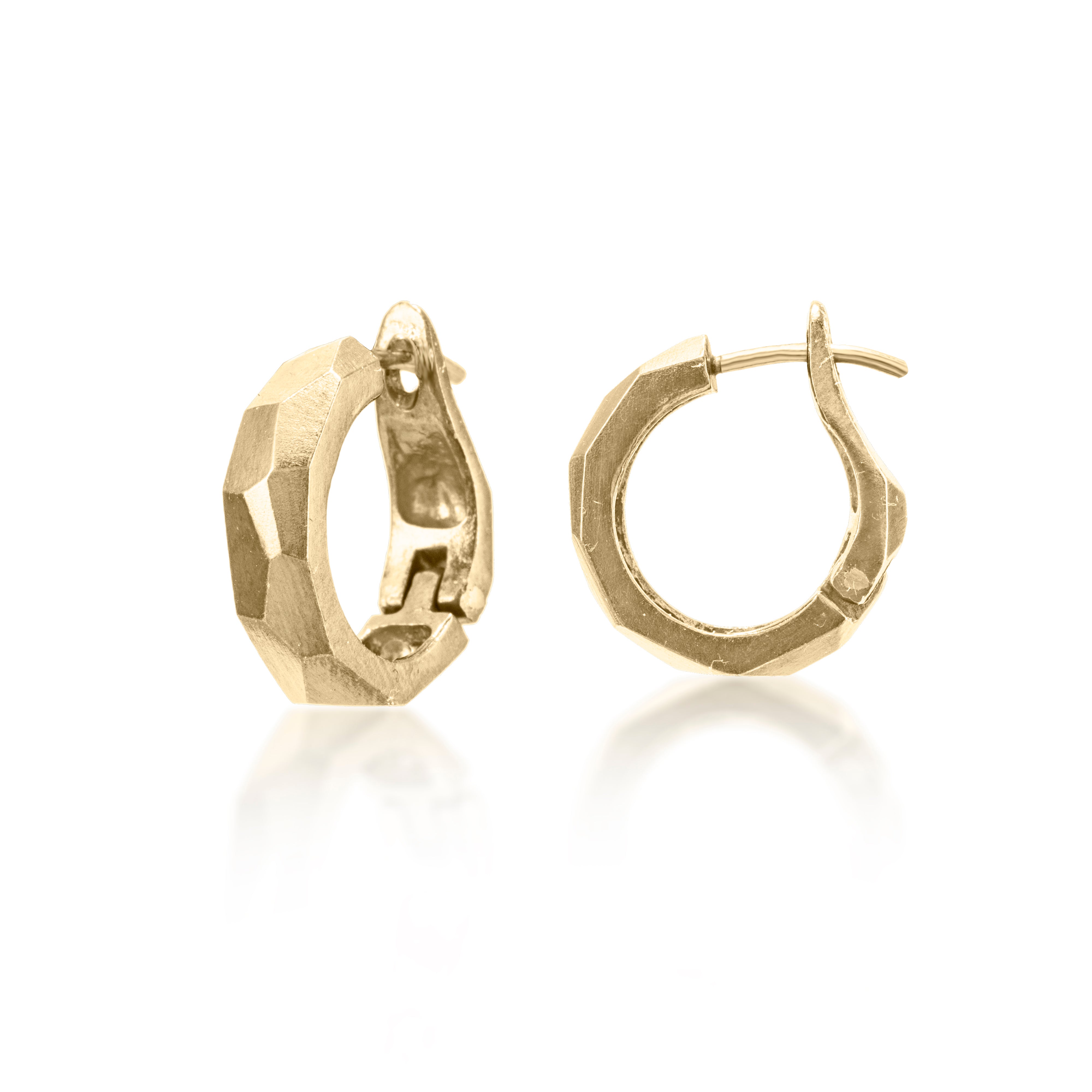 Chunky little huggie hoops, crisply hand faceted in four color ways, oxidized silver, 18k gold, palladium or platinum. 18k ear posts and a satisfying click closer.