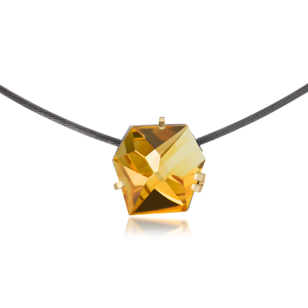 This small size Facets necklace of natural gemstone is set in oxidized silver. Clean lines and a geometric form join to create this neckpiece with a unique, hand cut faceted chunk of gemstone prong set in 18k gold, coupled with a simple neckring of oxidized sterling. Necklace features a friction tube clasp to produce a continuous, uninterrupted line. Gemstone 8.5 tcw.