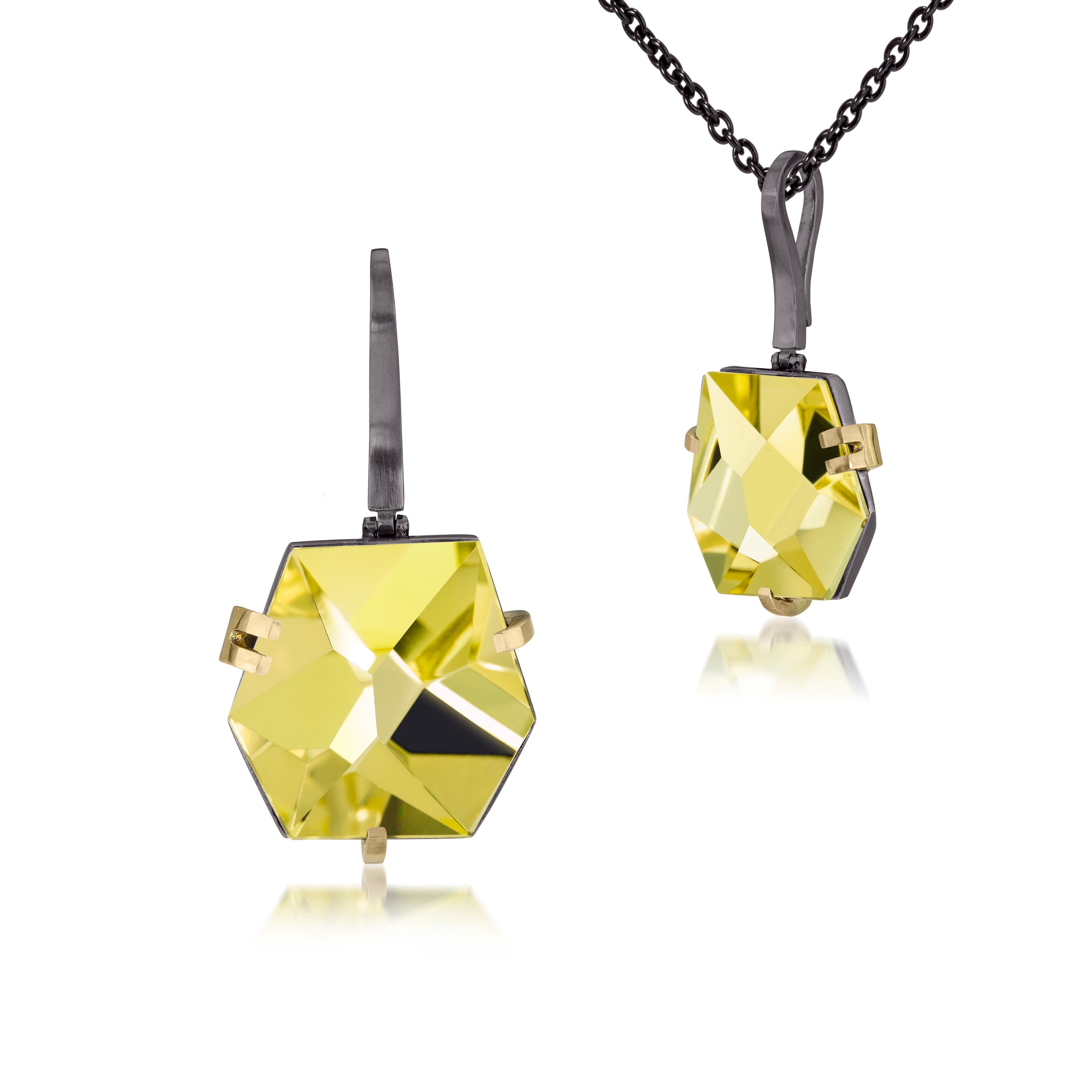 This medium size Facets pendant in oxidized sterling and 18k gold is set with natural gemstone. Unique, hand cut faceted chunks of gemstone are prong set in 18k gold prongs hang from a small bail of 18k gold or oxidized silver. 