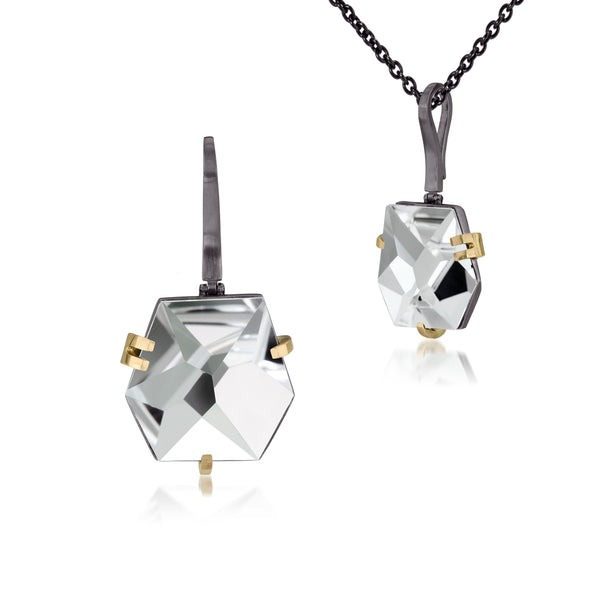 This medium size Facets pendant in oxidized sterling and 18k gold is set with natural gemstone. Unique, hand cut faceted chunks of gemstone are prong set in 18k gold prongs hang from a small bail of 18k gold or oxidized silver. 