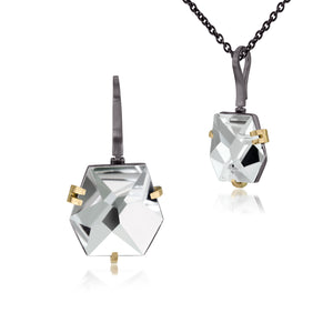This medium size Facets pendant in oxidized sterling and 18k gold is set with natural gemstone. Unique, hand cut faceted chunks of gemstone are prong set in 18k gold prongs hang from a small bail of 18k gold or oxidized silver. 