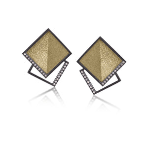 This square post earring in oxidized silver and richly textured 18k bimetal, is flush set with ideal cut white diamonds. It features 14k gold posts. Accent facet glitters with the texture of diamond facets, individually scored and textured.  Medium size 0.267 tcw, small size 0.173 tcw.