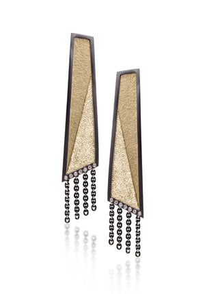 This earring in oxidized sterling silver and richly textured 18k bimetal, is flush set with ideal cut white diamonds. It features 14k gold posts or 18k gold ear wires. Accent facet glitters with the texture of diamond facets, individually scored and textured. Elongated shape, size large. Available in post, post fringe, drop and drop fringe styles.  0.0966 tcw