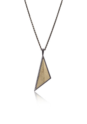 This oxidized sterling silver and richly textured 18k bimetal is flush set with ideal cut white diamonds.  Accent facet glitters with the texture of diamond facets, individually scored and hand textured. Available as a simple pendant or with fringe.  0.1725 tcw